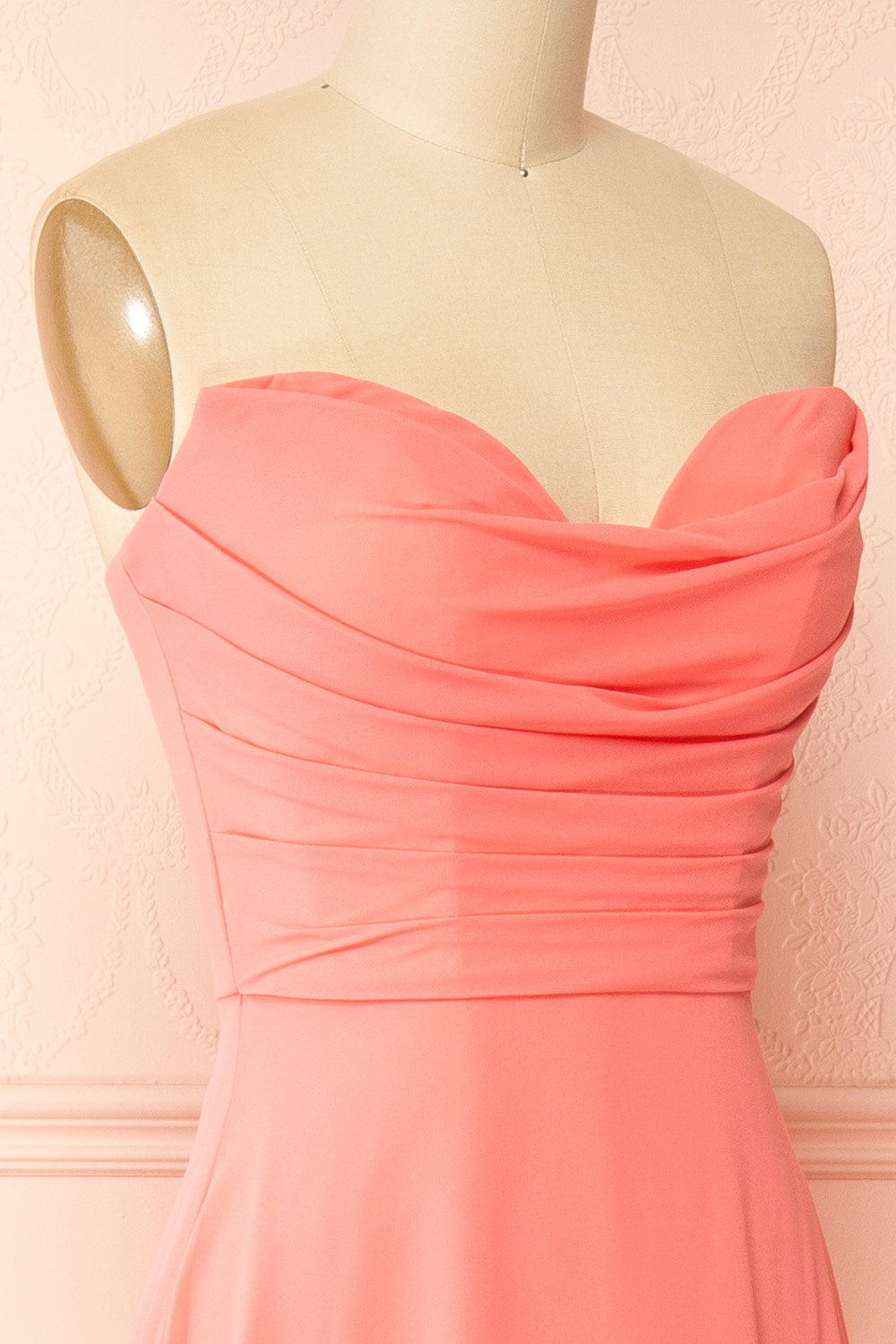 side of a sewing mannequin wearing Janie Coral Chiffon Maxi Dress with Sweetheart Neckline from Boutique 1861