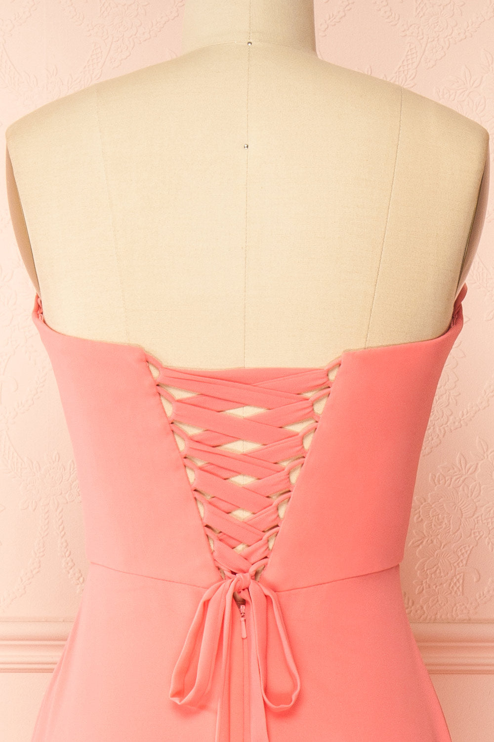 back of a sewing mannequin wearing Janie Coral Chiffon Maxi Dress with Sweetheart Neckline from Boutique 1861