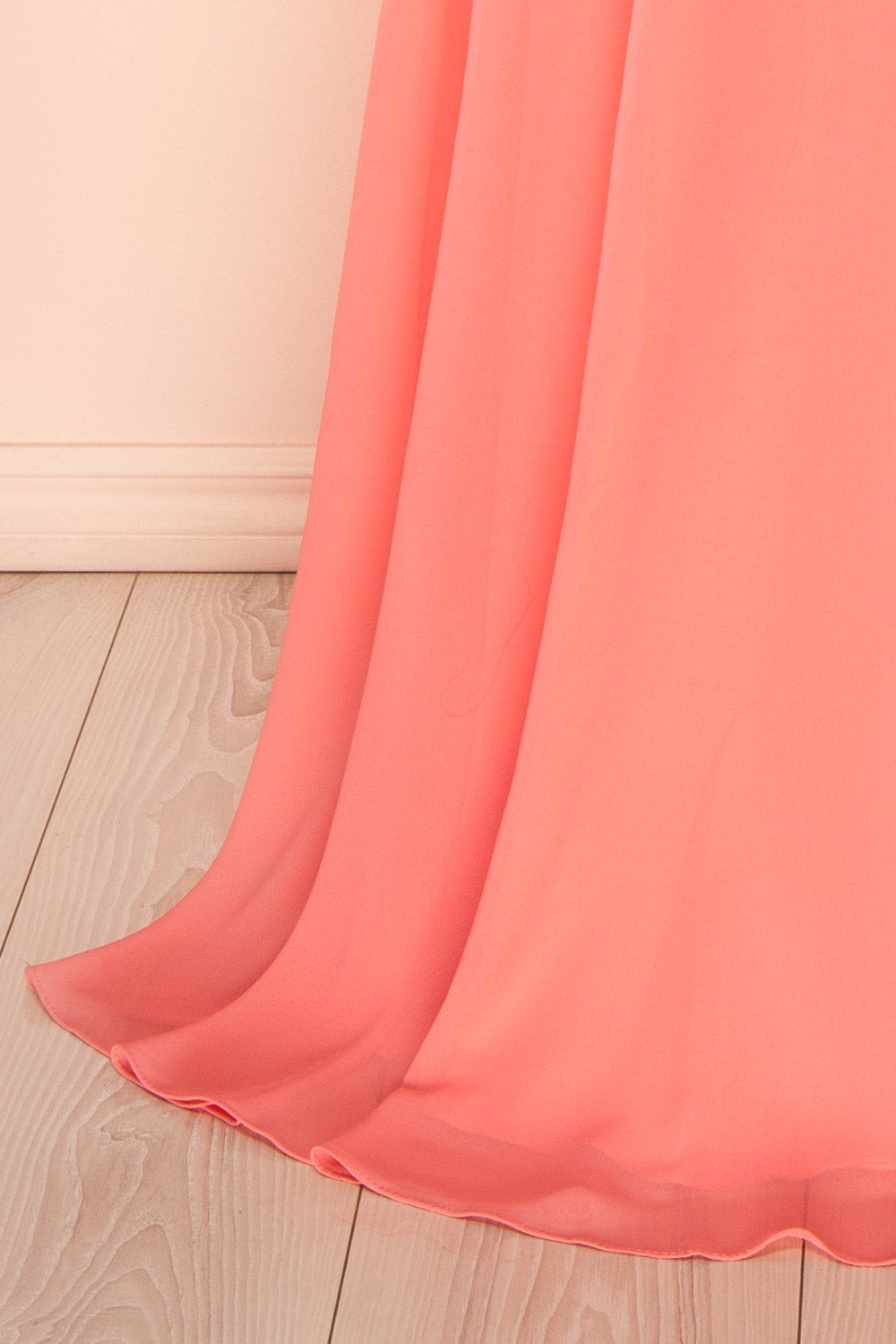 bottom of a sewing mannequin wearing Janie Coral Chiffon Maxi Dress with Sweetheart Neckline from Boutique 1861