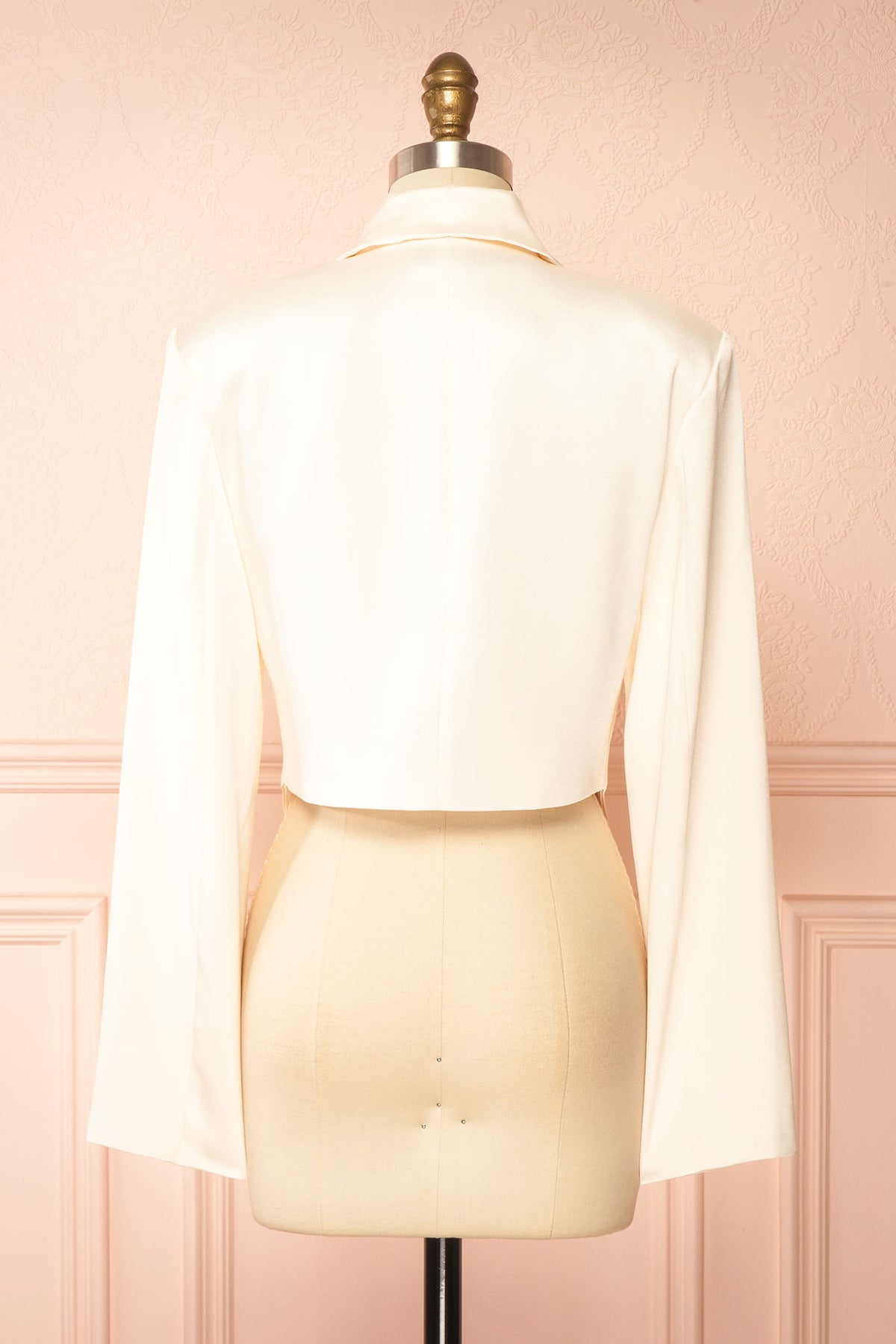 Back view of Jeanilia Ivory Cropped Satin Blazer at Boutique 1861