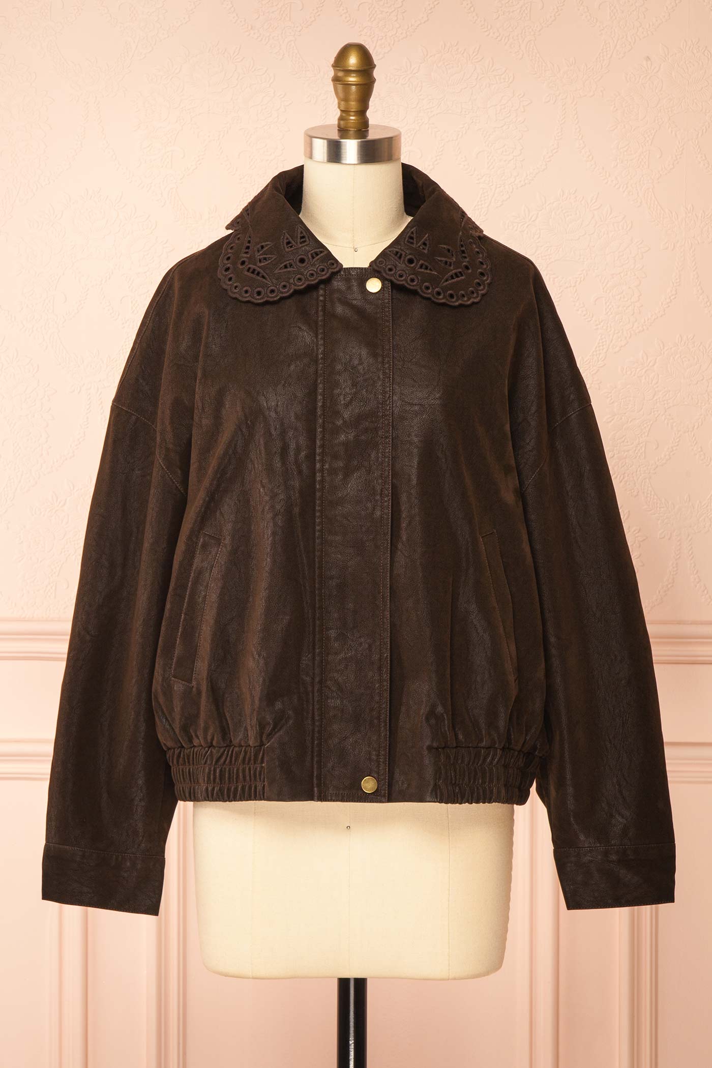 front view of Jeremia Brown Faux Leather Embroidered Collar Bomber Jacket at Boutique 1861