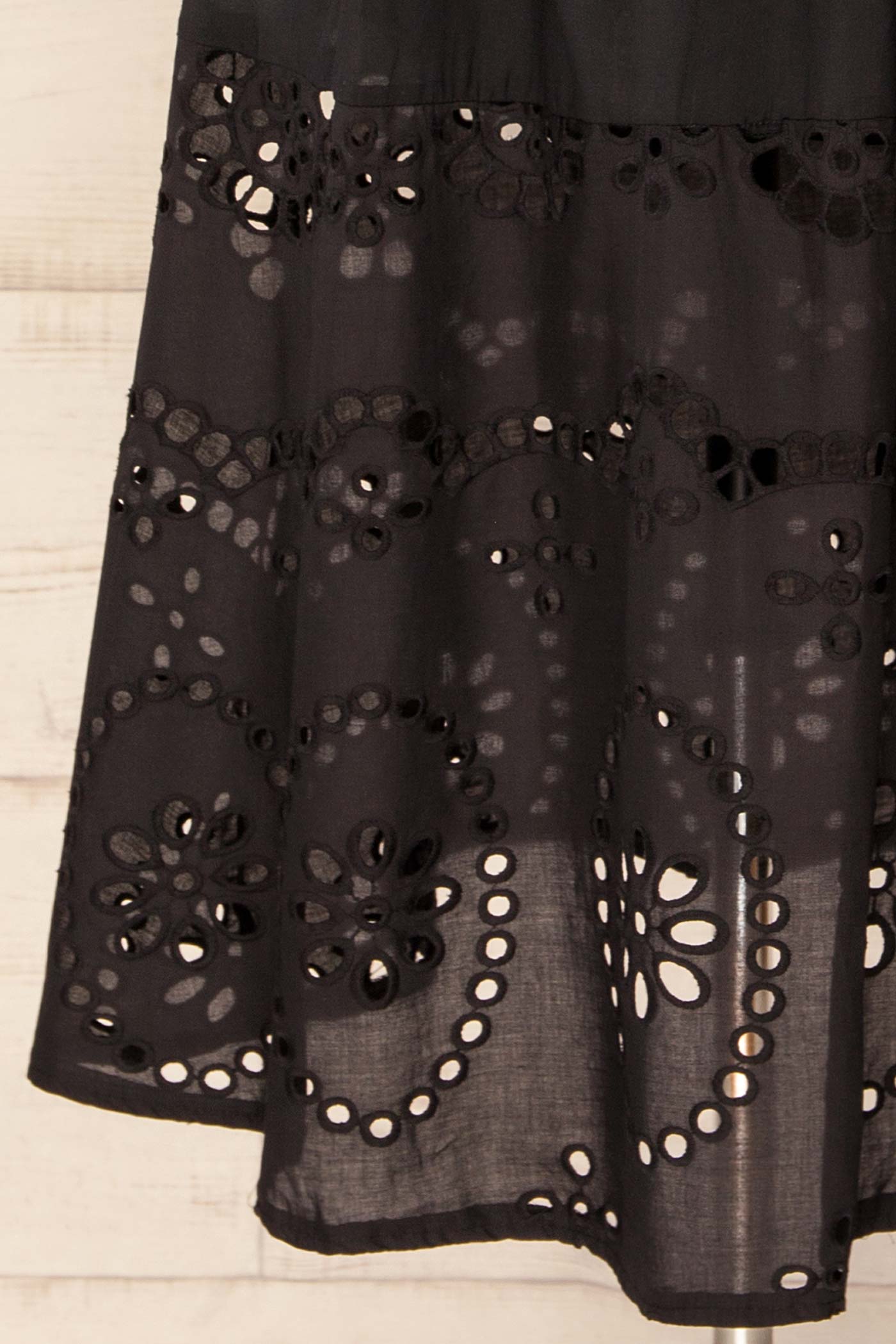 Close-up Jolene Black Midi Skirt with Eyelets and Pockets at la petite garçonne