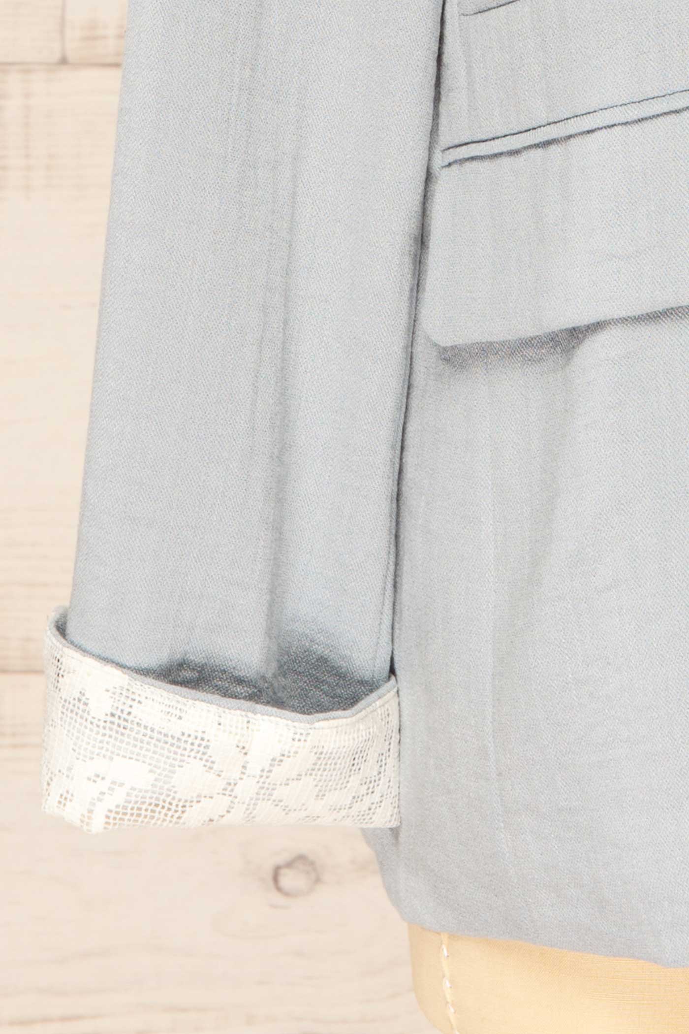 Close-up view Kandla Oversized Light Blue Blazer with Lace Cuff Detail at la petite garçonne