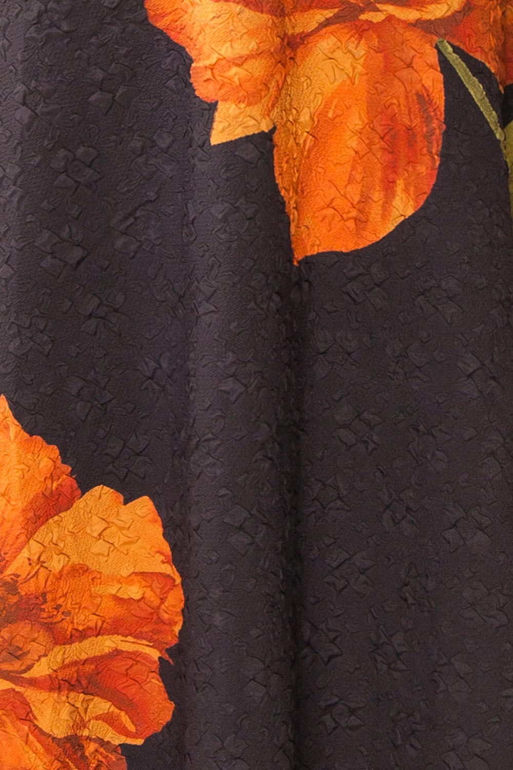 fabric of a Mannequin wearing the Kerina Midi Floral Strapless Dress from boutique 1861