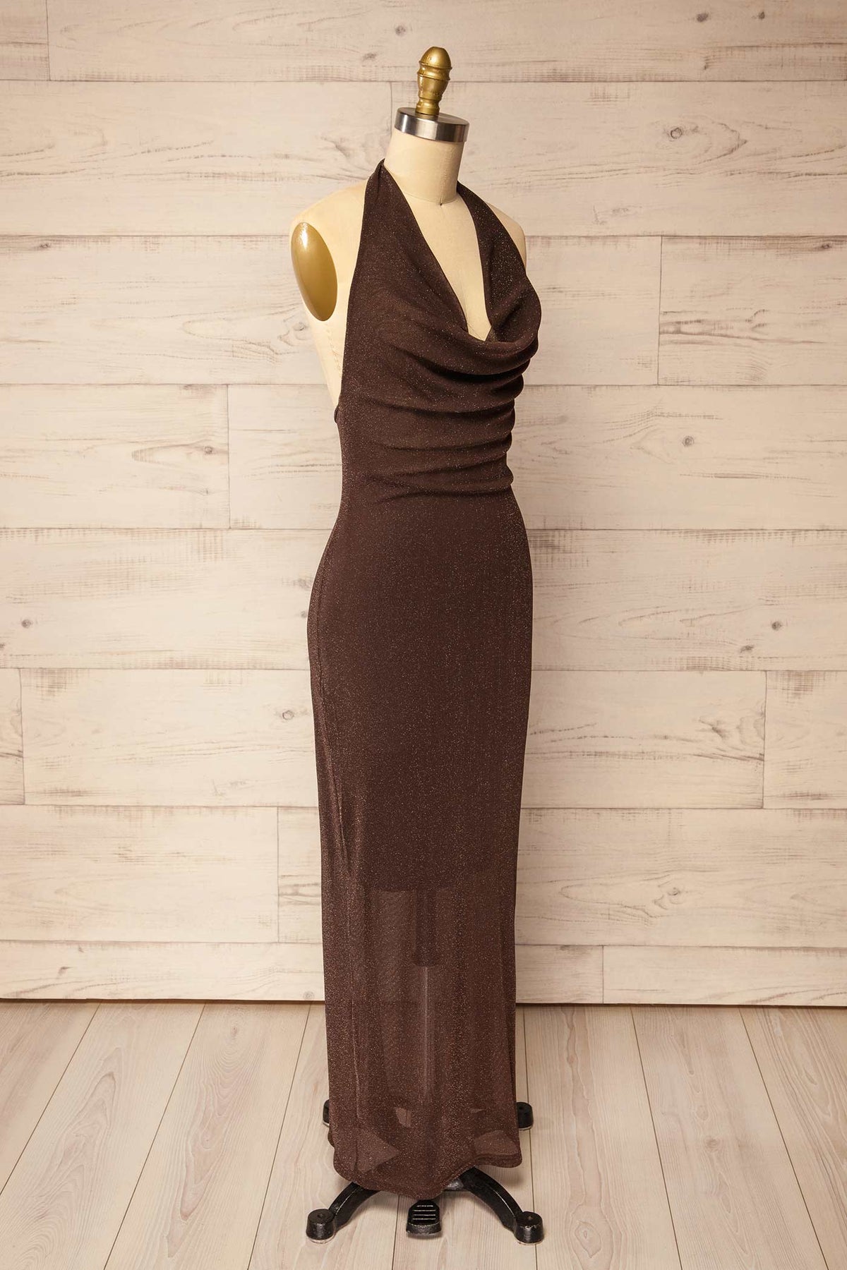 side view of Kivitoo Brown Shimmery Cowl Neck Halter Maxi Dress at La petite garçonne
