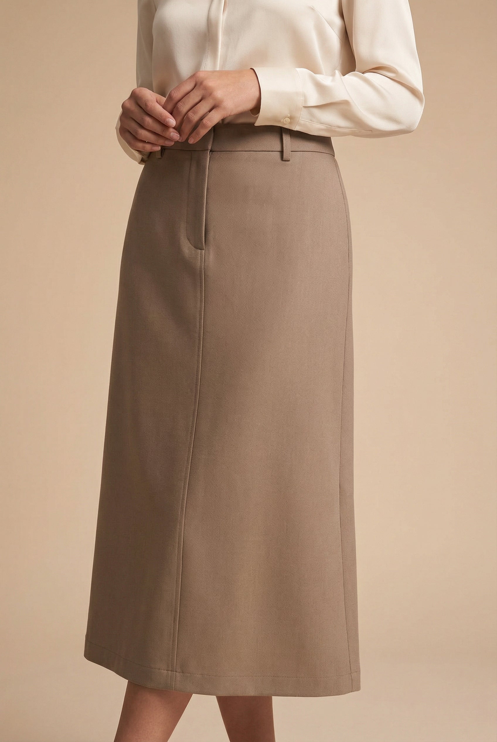 woman wearing Lacombe Taupe A-Line Midi Skirt from La petite garçonne front