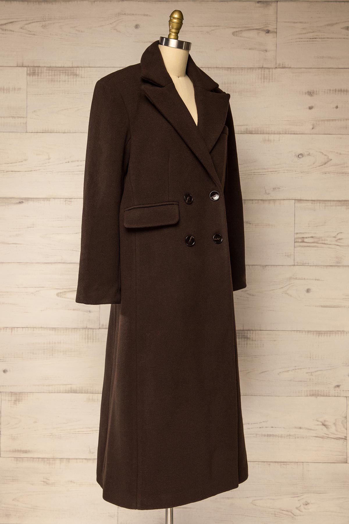 side view of Lagos Brown Long Double-Breasted Coat with Lapel Collar at La petite garçonne
