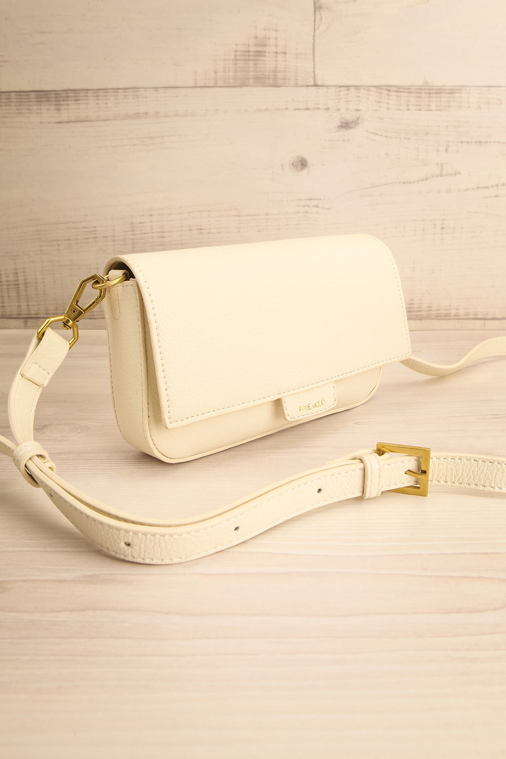 Laryssa Ivory Vegan Leather Crossbody Bag | La petite garçonne side view