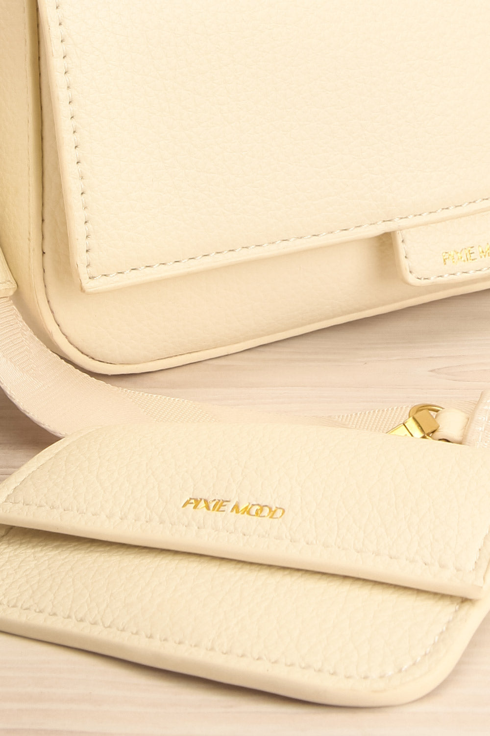 Laryssa Ivory Vegan Leather Crossbody Bag | La petite garçonne side pocket close-up