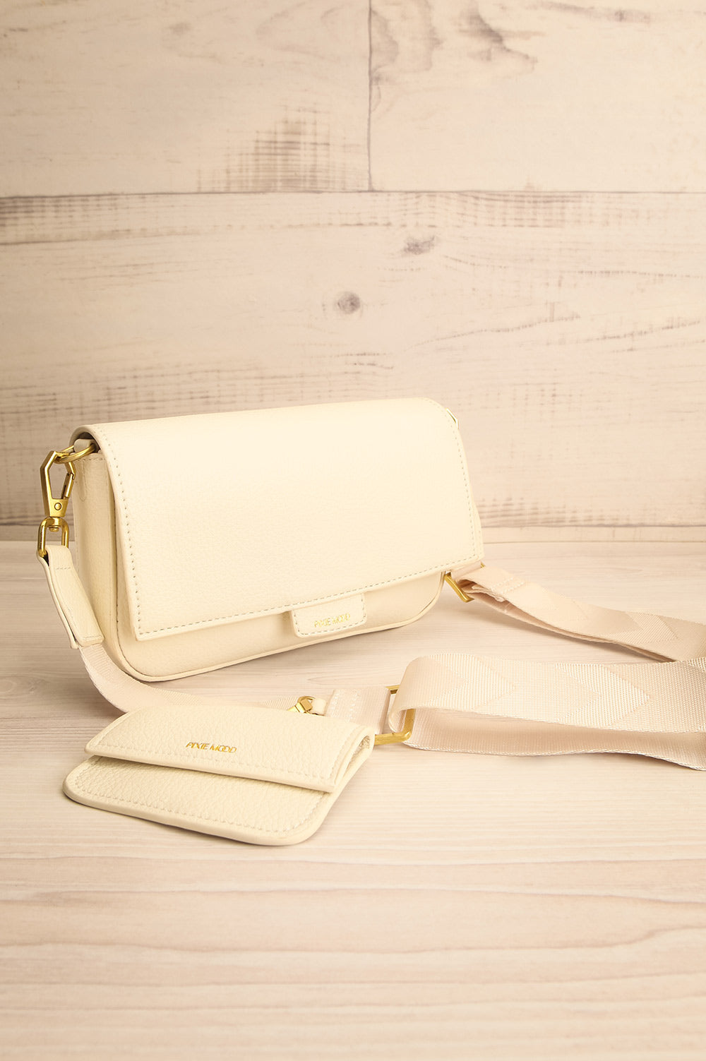 Laryssa Ivory Vegan Leather Crossbody Bag | La petite garçonne side pocket view