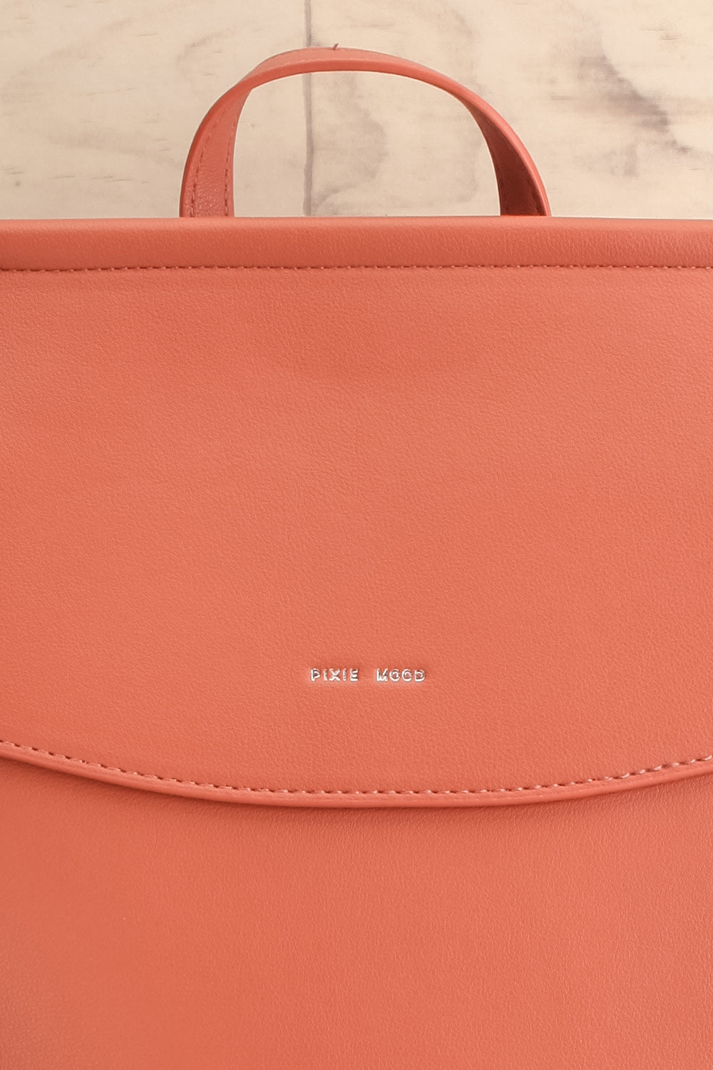 Laucala Pink Small Vegan Leather Backpack | La petite garçonne front close-up
