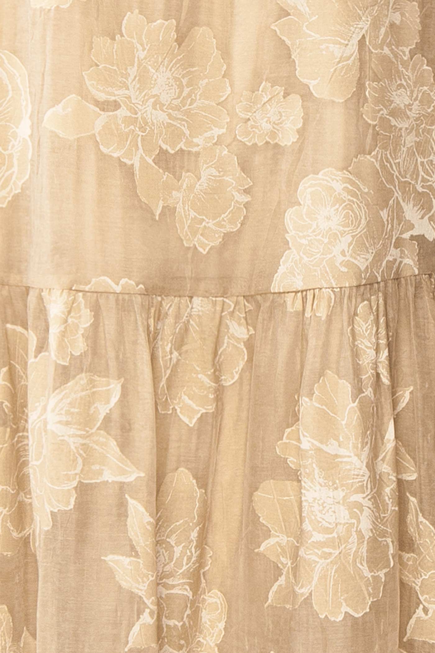 Close-up of Laurelgrove Long Halter Neck Floral Beige Dress at boutique 1861