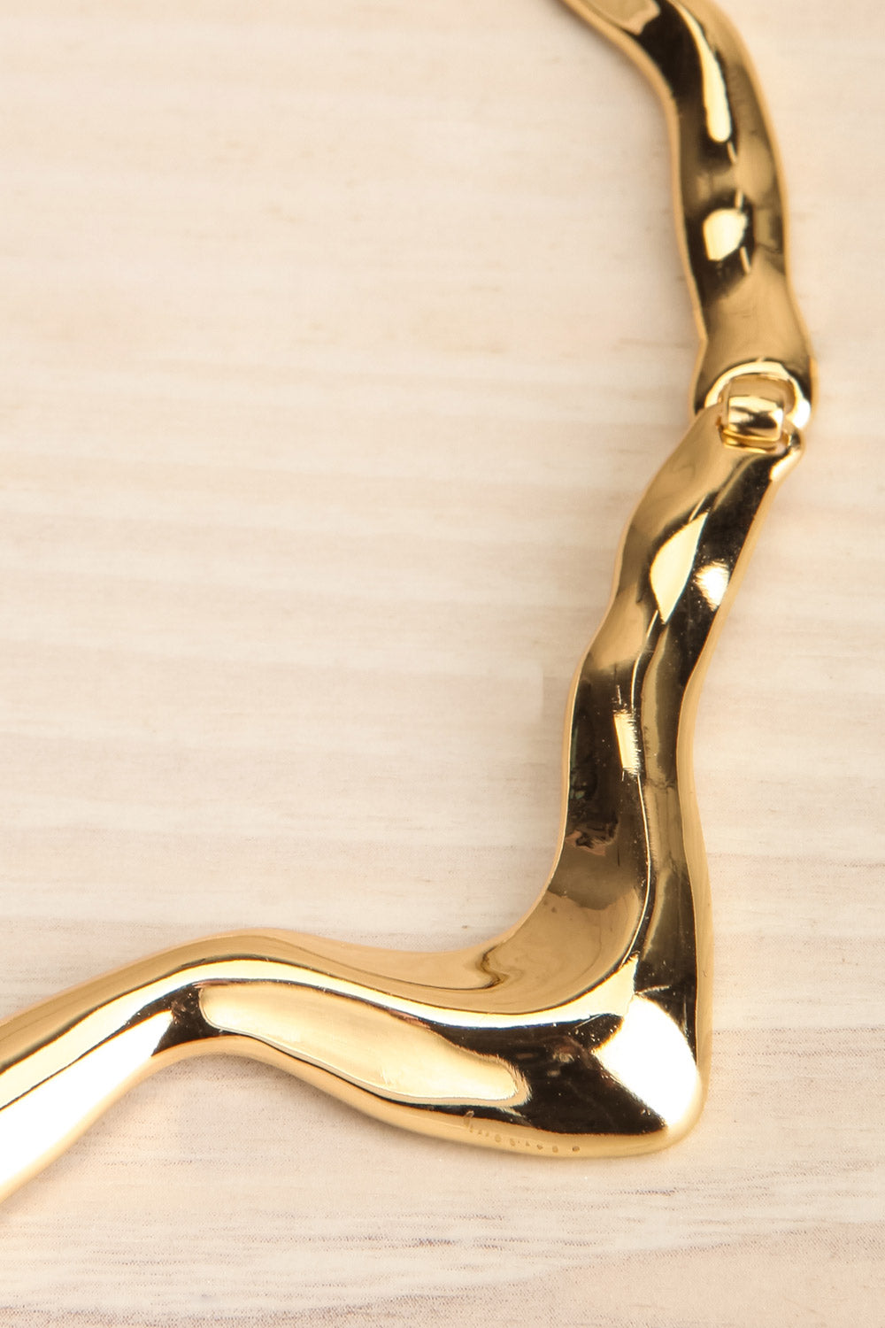 Livarot Gold Asymmetrical Necklace | La petite garçonne flat close-up