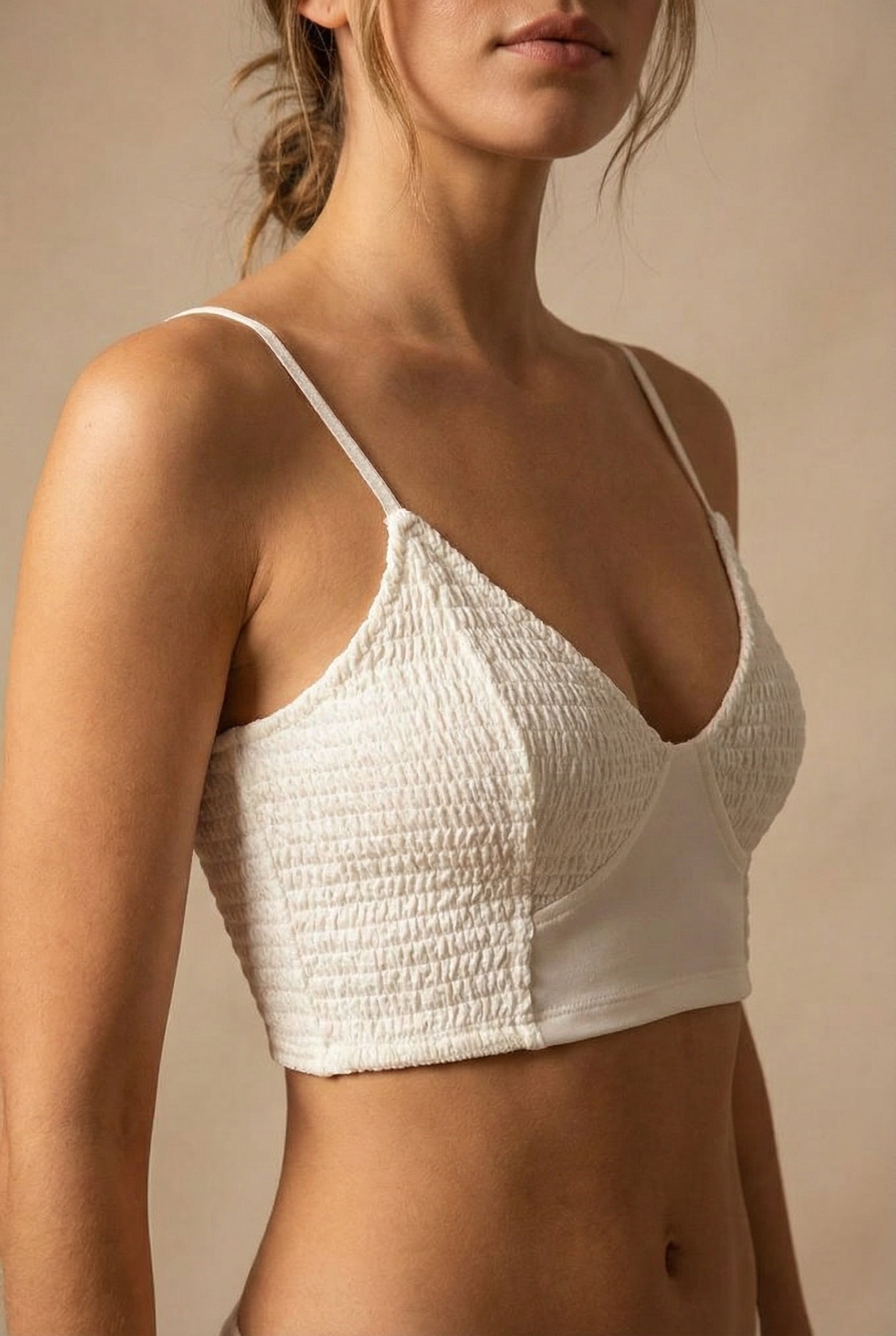 woman wearing Lustleigh White Cropped Ruched Camisole from La petite garçonne
