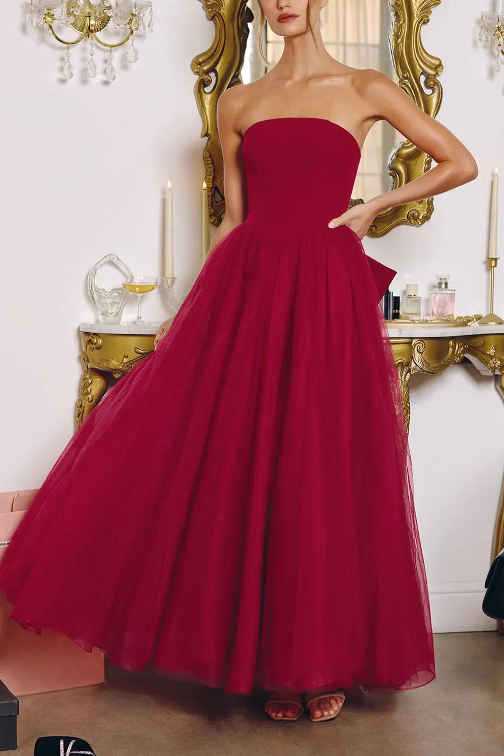 front view of a woman wearing Makoto Burgundy Maxi Strapless A-Line Dress from Boutique 1861