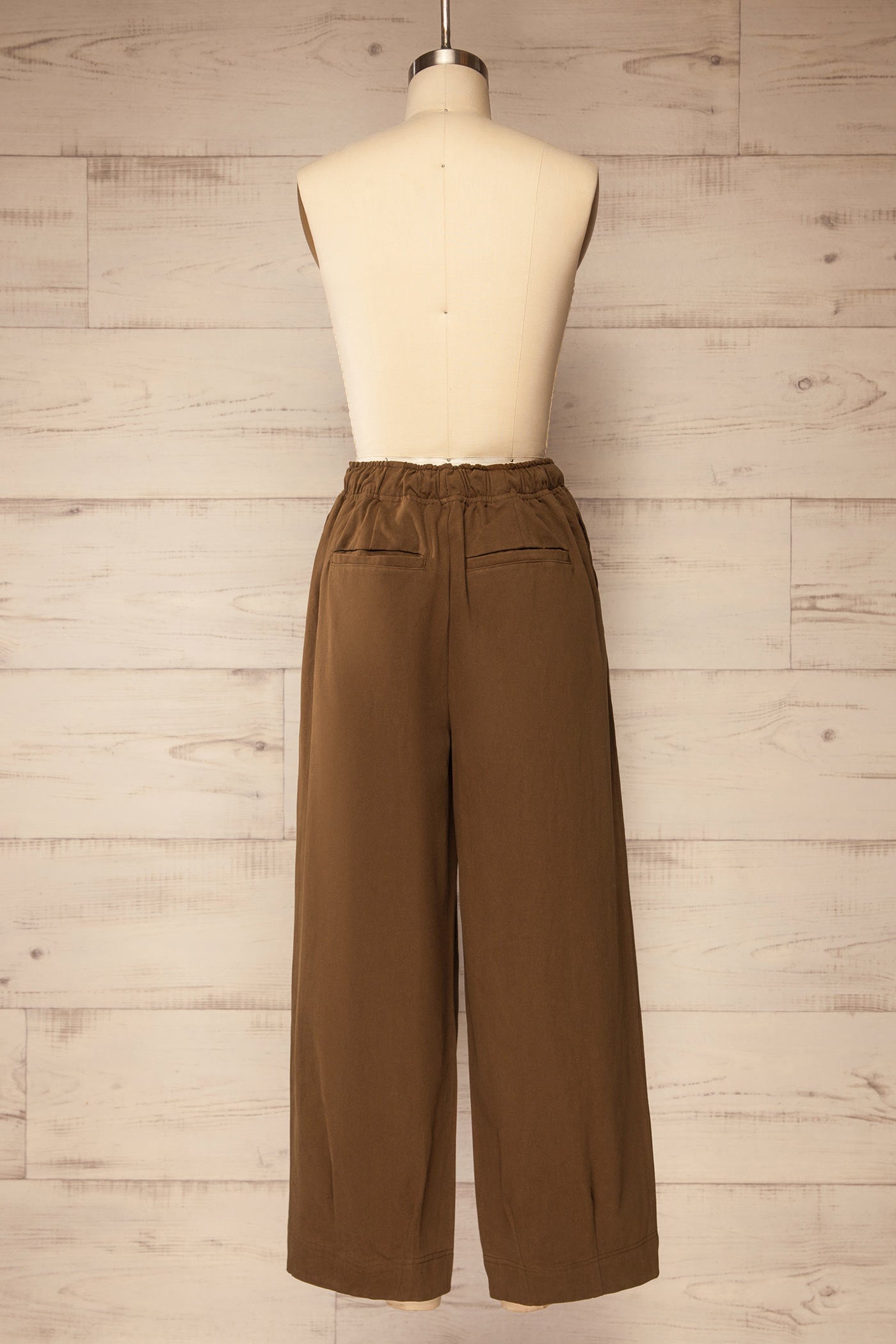 back view of Malegaon Brown High-Waisted Cropped Pants with Drawstring at La petite garçonne