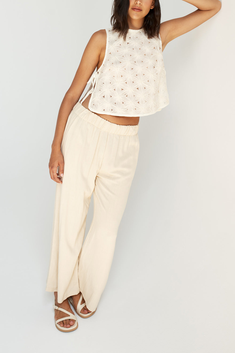 Manza Ivory Floral Eyelet Side-Tie Cropped Top by Dailystory | La petite garçonne view