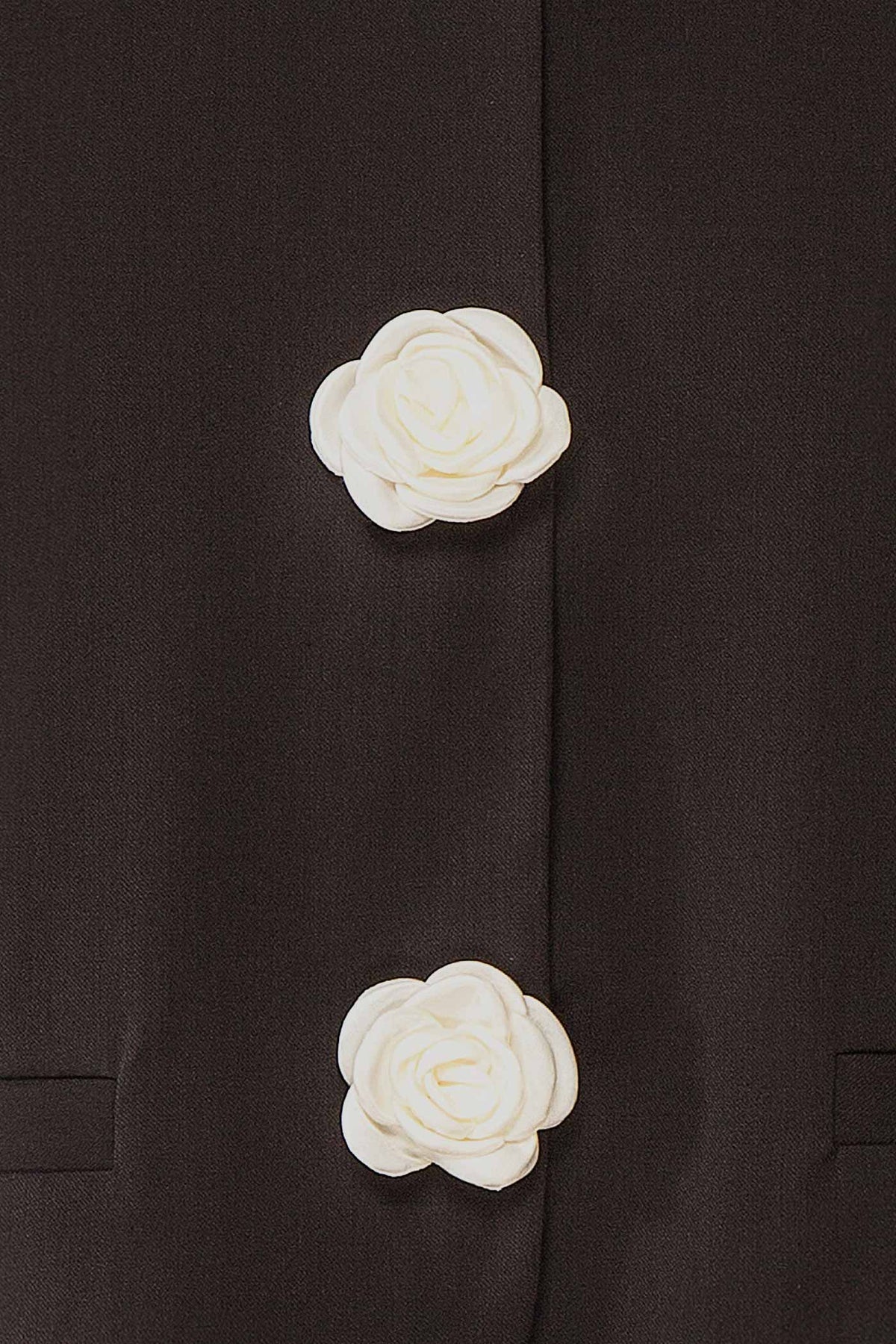 fabric view of Meera Black Cropped Blazer with Flower Buttons at Boutique 1861