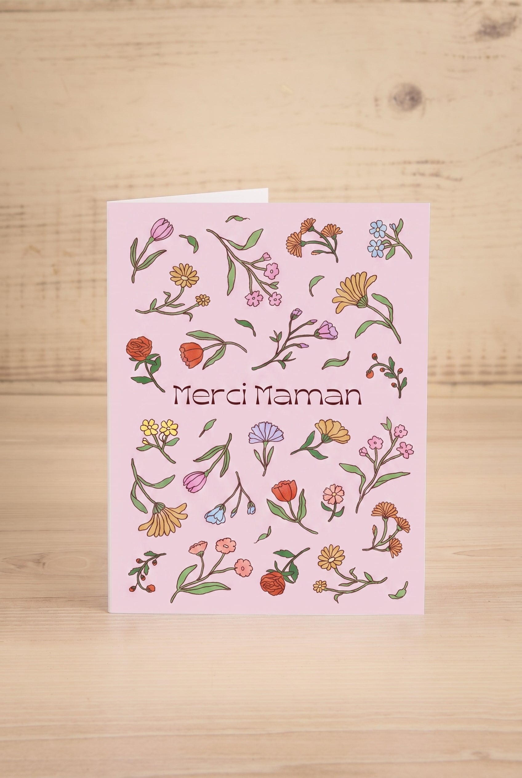 photo of a greeting card at maison garçonne saying Merci Maman by Foonie