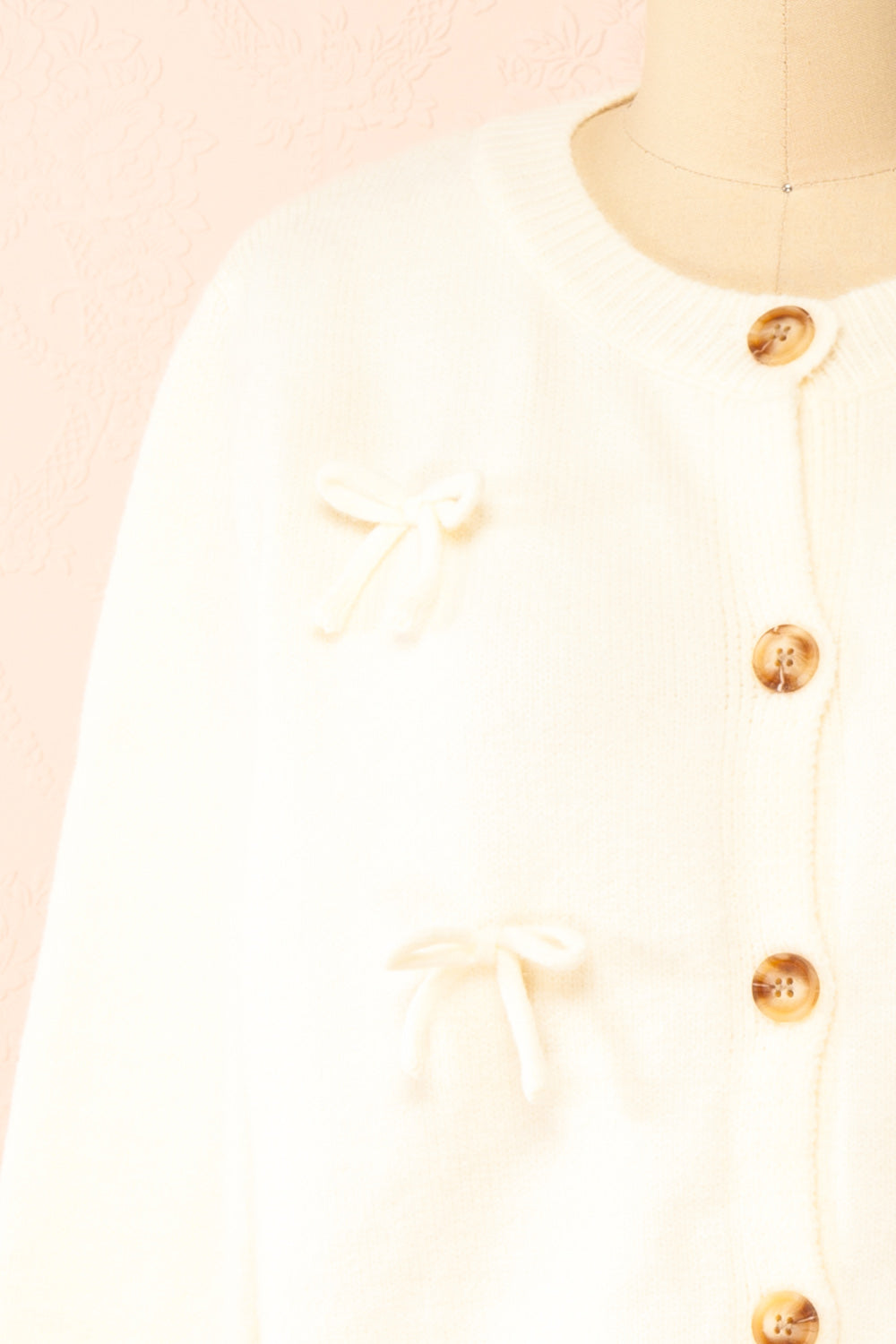 Minara Ivory Button-Down Cardigan w/ Bows | Boutique 1861 front