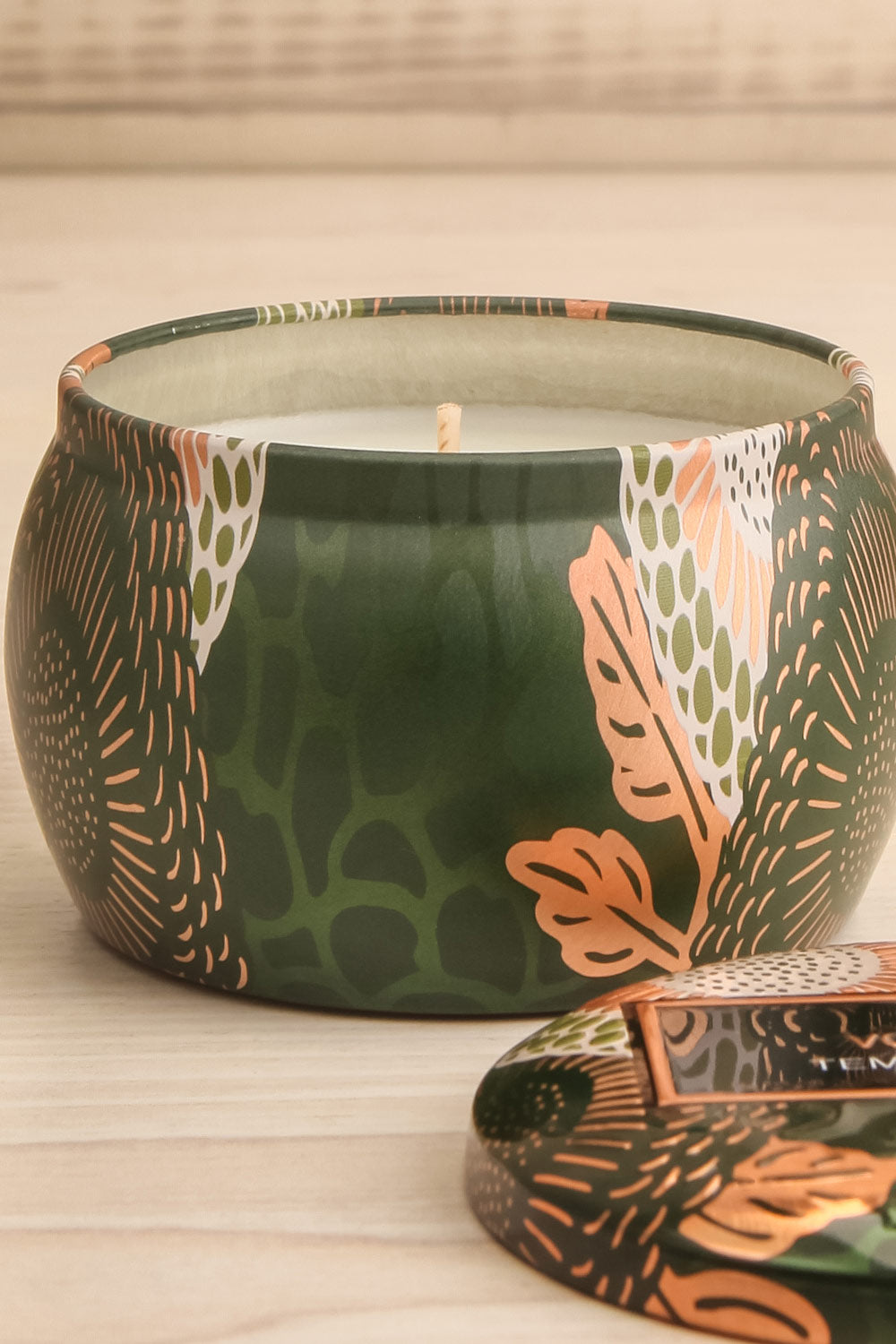 Temple Moss Petite Tin Candle by Voluspa | Maison garçonne open close-up