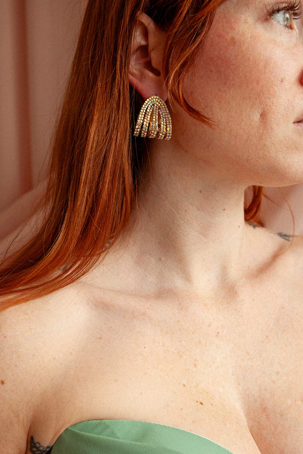 woman wearing Moana Gold Iridescent Crystal Earrings from Boutique 1861
