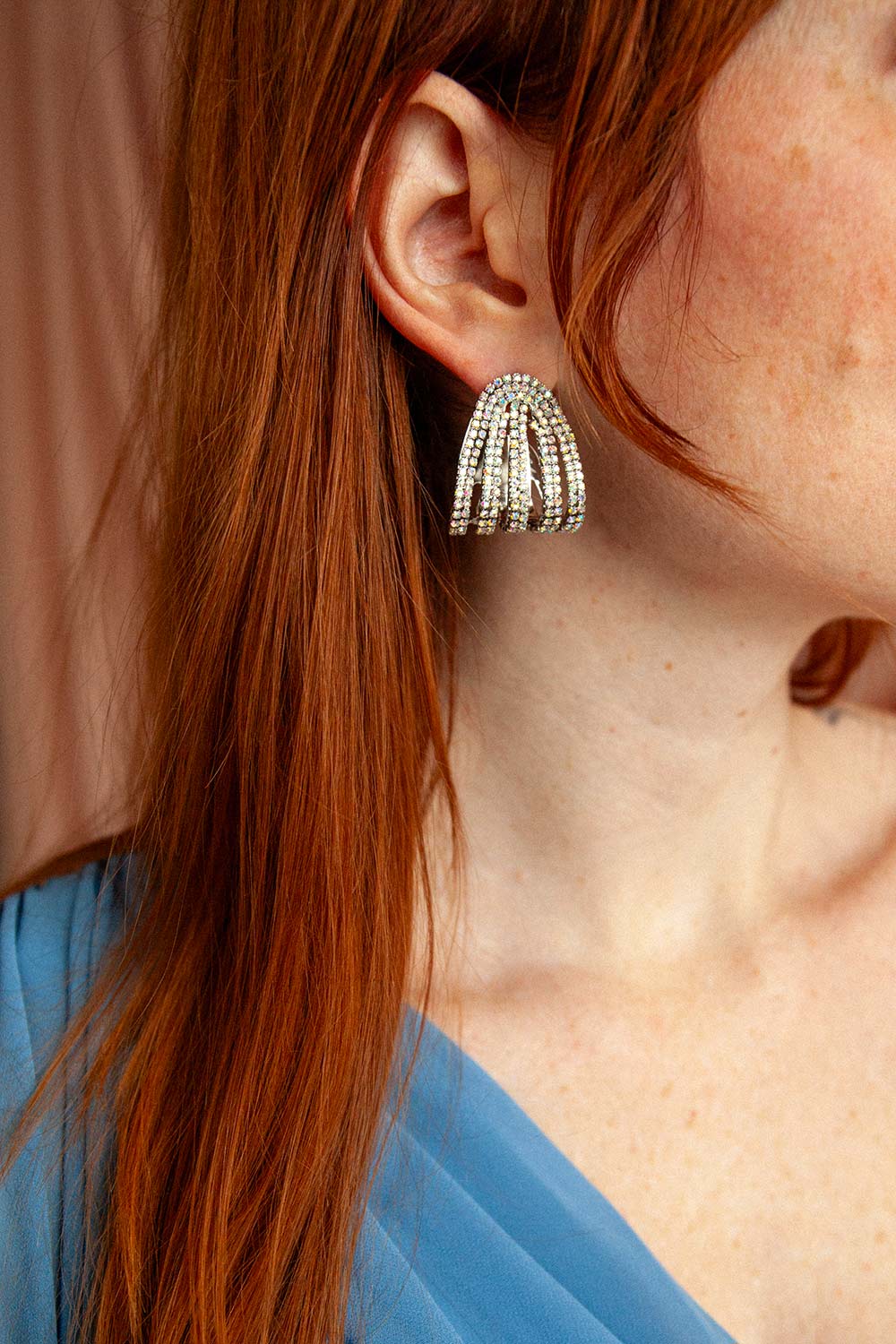 woman wearing Moana Silver Iridescent Crystal Earrings from Boutique 1861