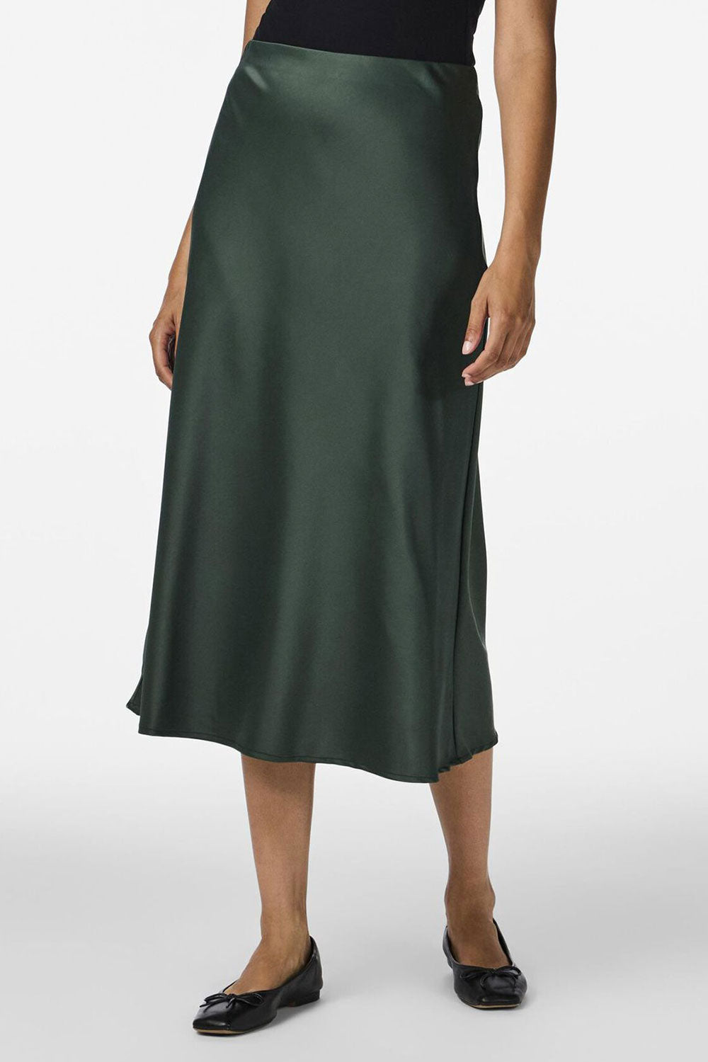 person wearing Molokai Midi Emerald Satin Skirt from La petite garçonne front