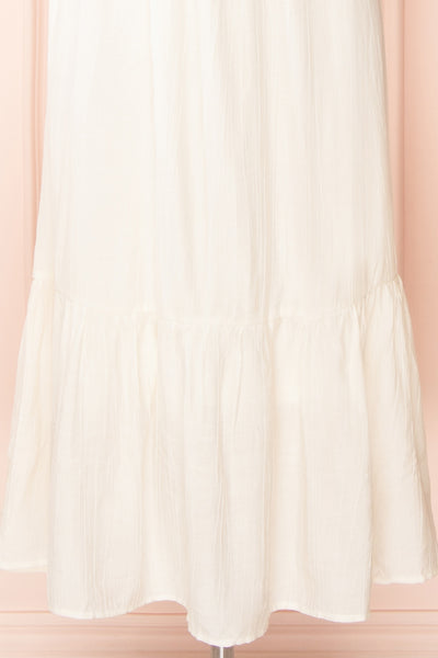 Myrtille Ivory Midi Dress w/ Ruffled Sleeves | Boutique 1861 bottom close-up