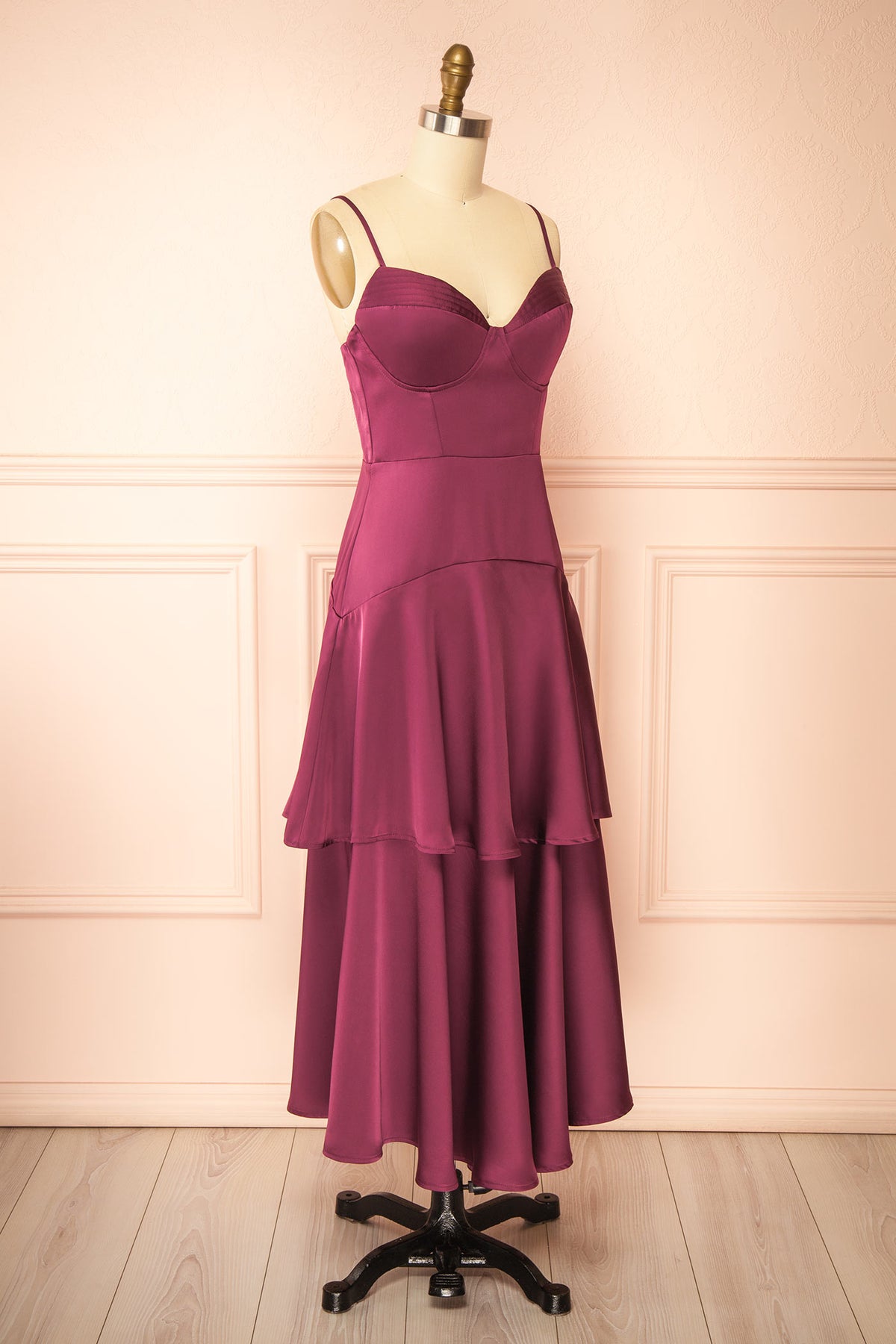 side view of Nasella Burgundy Tiered Satin Midi Dress at Boutique 1861