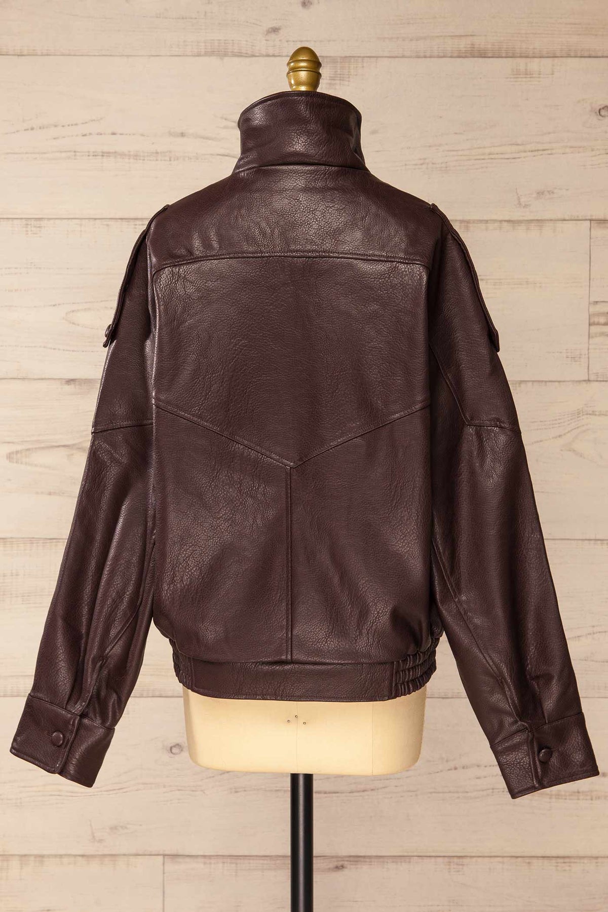 back view of Navarrenx Brown Faux Leather High Collar Jacket at La petite garçonne