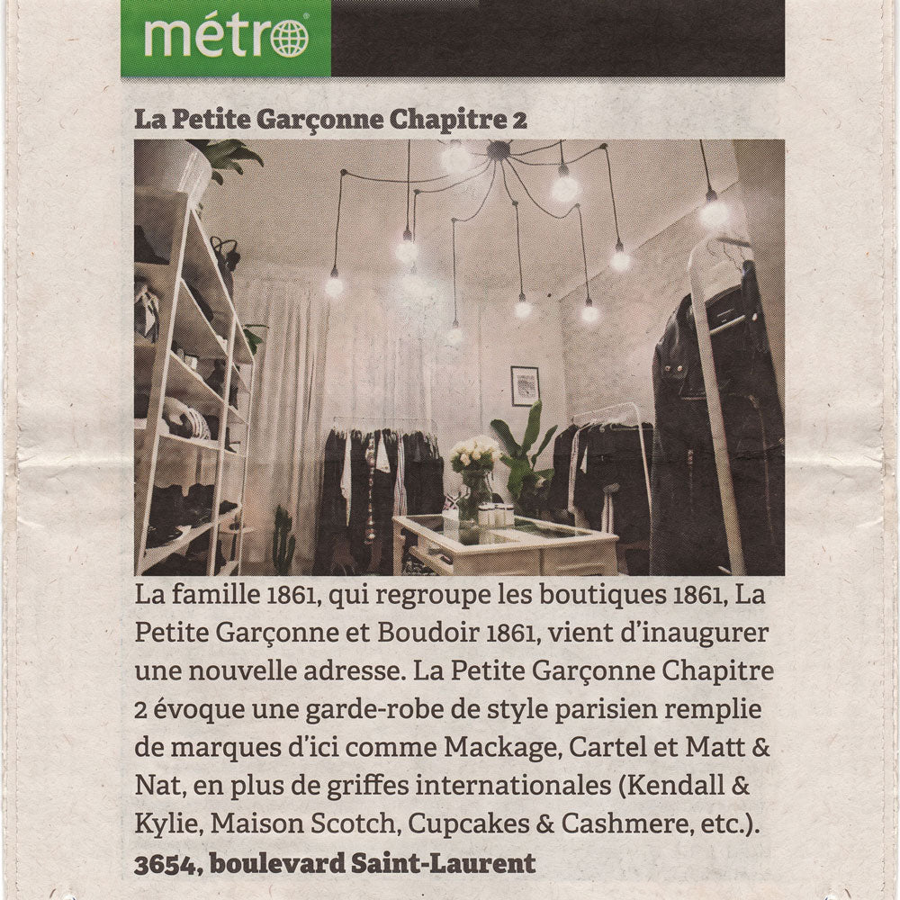 Newspaper clipping with an article about a new store opening La Petite Garçonne Chapitre 2