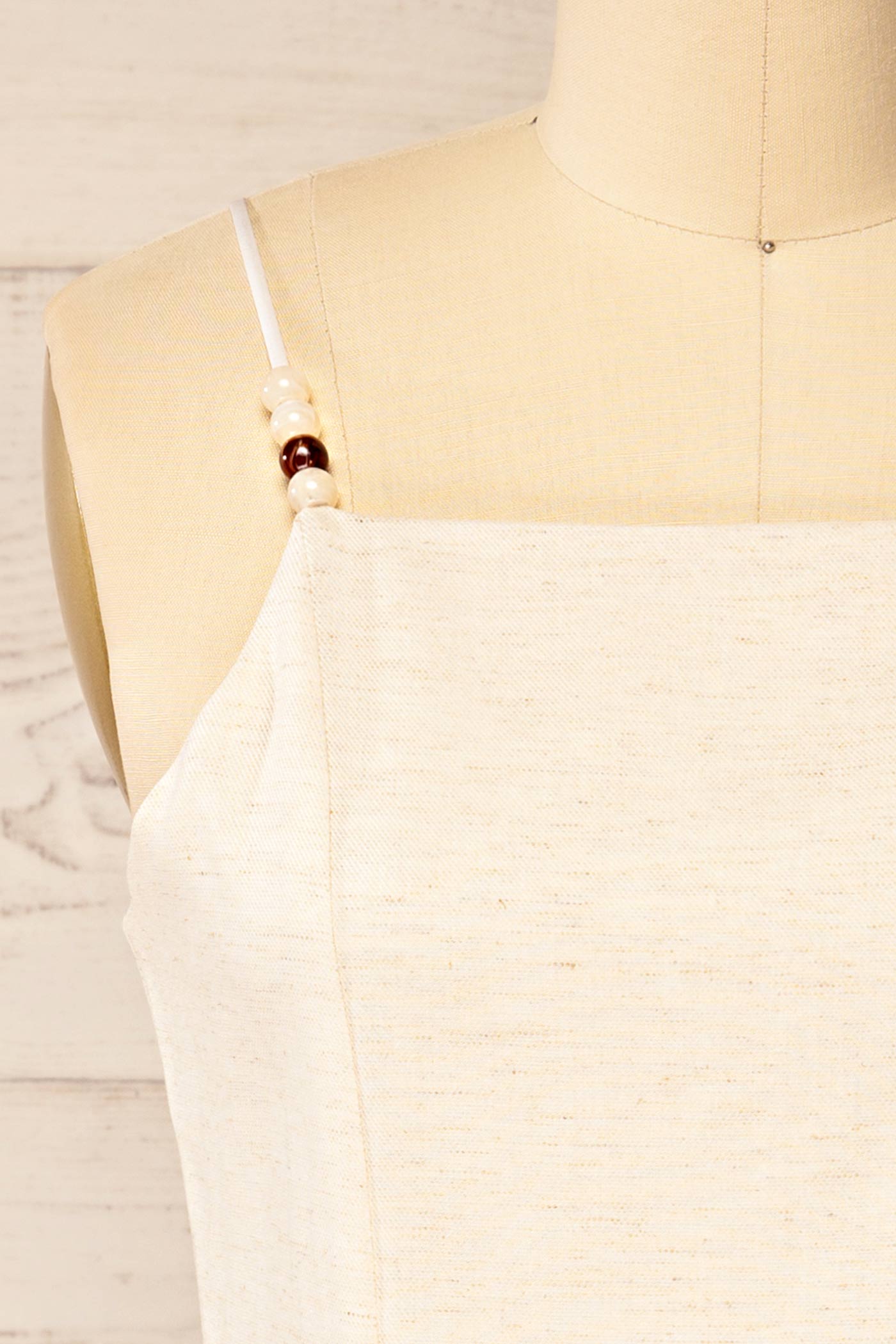 Close-up of Nikkita beige Beaded Strap Square-Neck Camisole at la petite garçonne