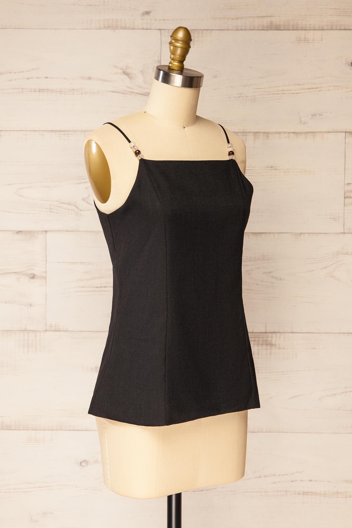 Sideview of Nikkita Black | Beaded Strap Square-Neck Camisole at la petite garçonne