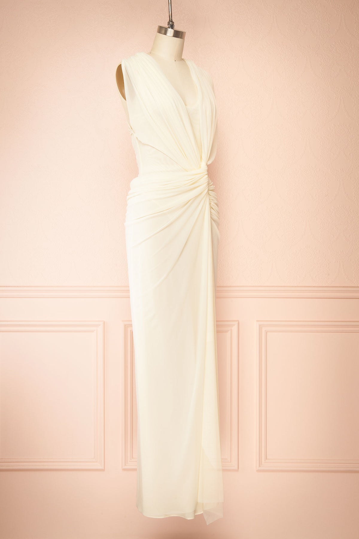 side view of Noriko Ivory Ruched Twist-Front Maxi Dress at Boudoir 1861