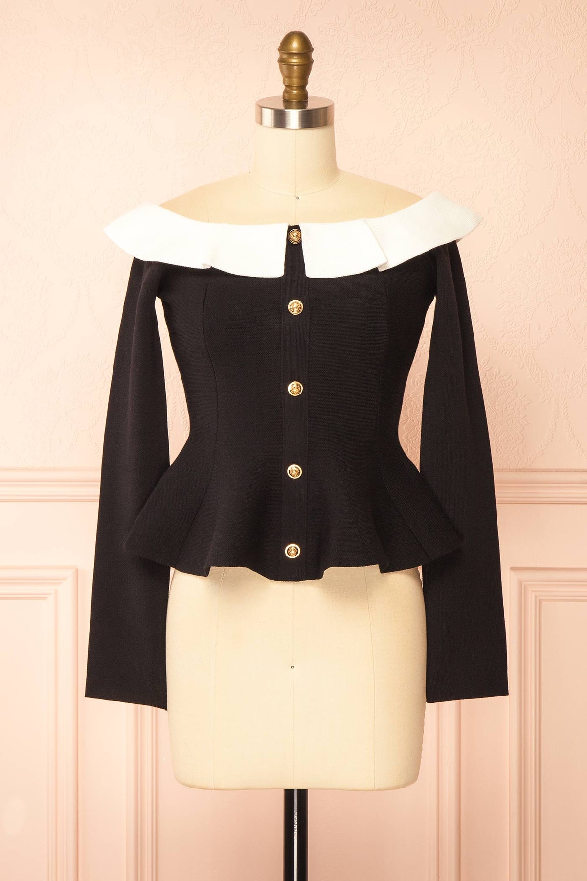 front view of Nuuk Black Off-the-Shoulder Peplum Top at Boutique 1861