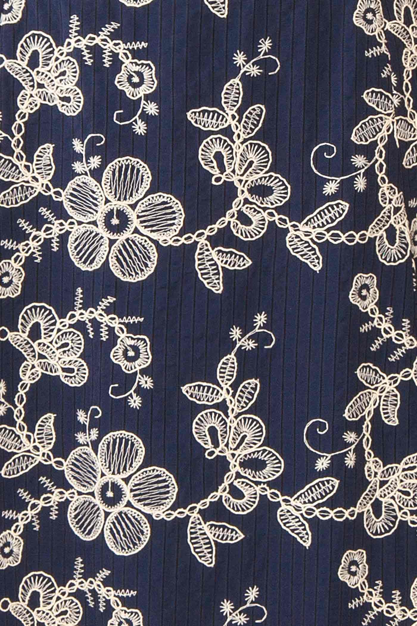 Close-up Oleander Navy Midi Dress with Embroidery at la boutique 1861