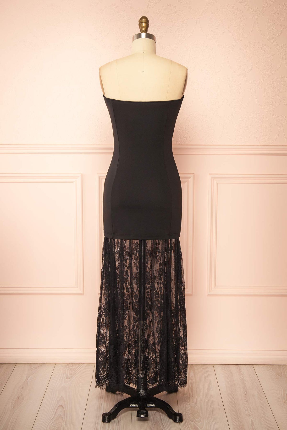 back view of Peronia Black Strapless Maxi Dress with Sheer Lace Hem at Boutique 1861