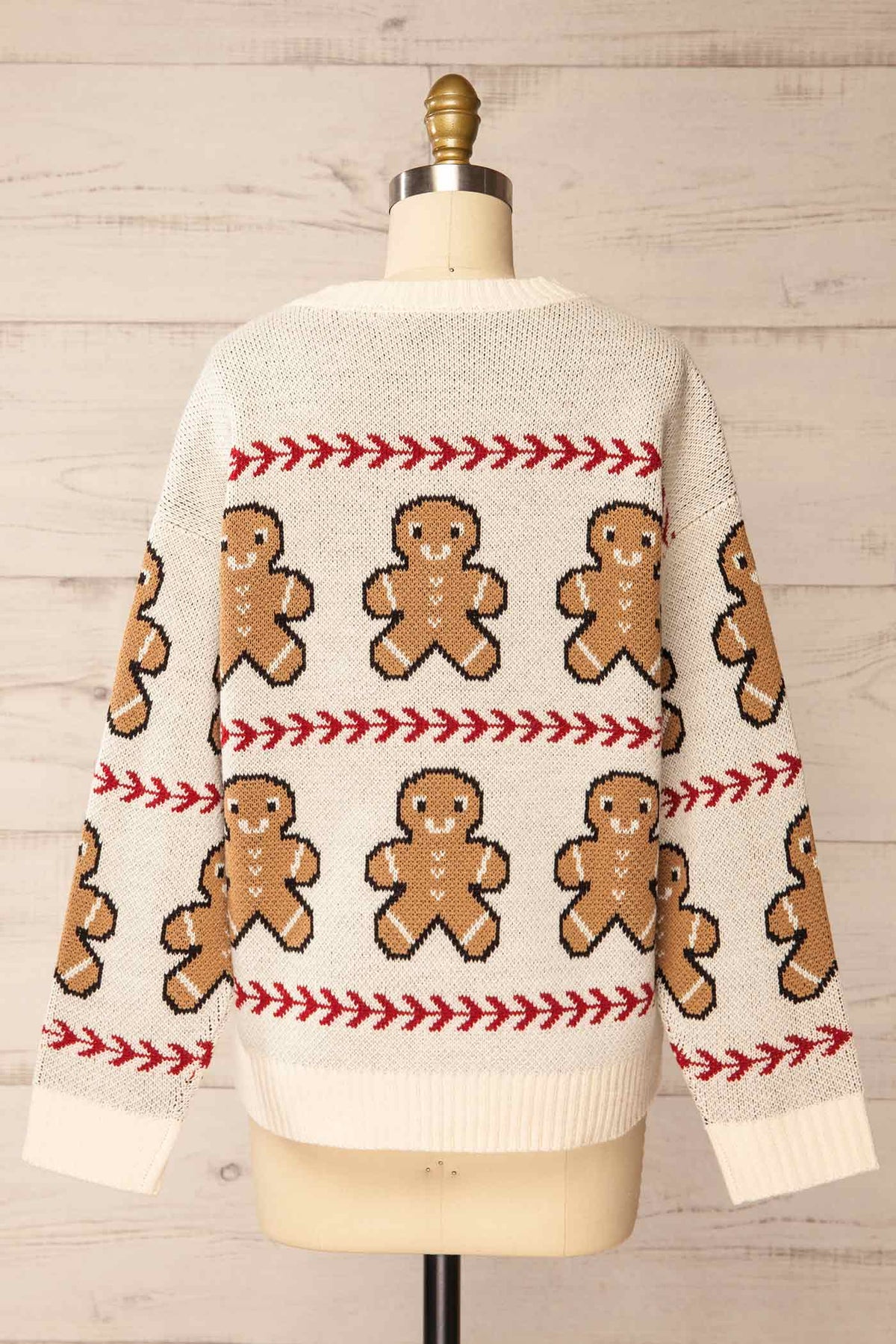 back view of Persia Ivory Gingerbread Pattern Knit Holiday Sweater at La petite garçonne