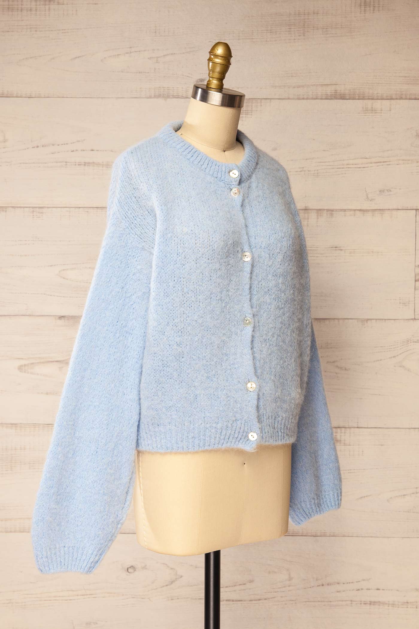 side view of Peruth Light Blue Button-Front Knit Cardigan at La petite garçonne