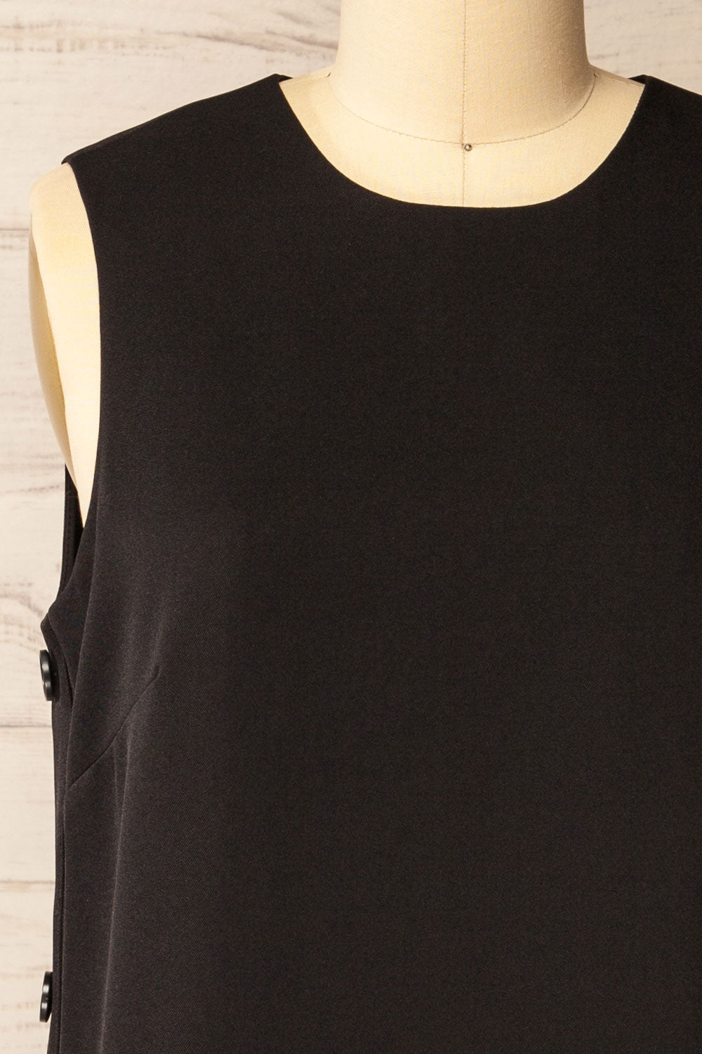 Phedi Black Sleeveless Dress with Button Detailing | La petite garçonne front