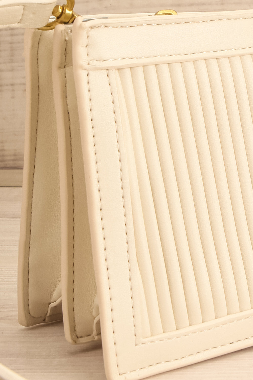 Purtalotum Ivory Pleated Vegan Leather Clutch | La petite garçonne side close-up
