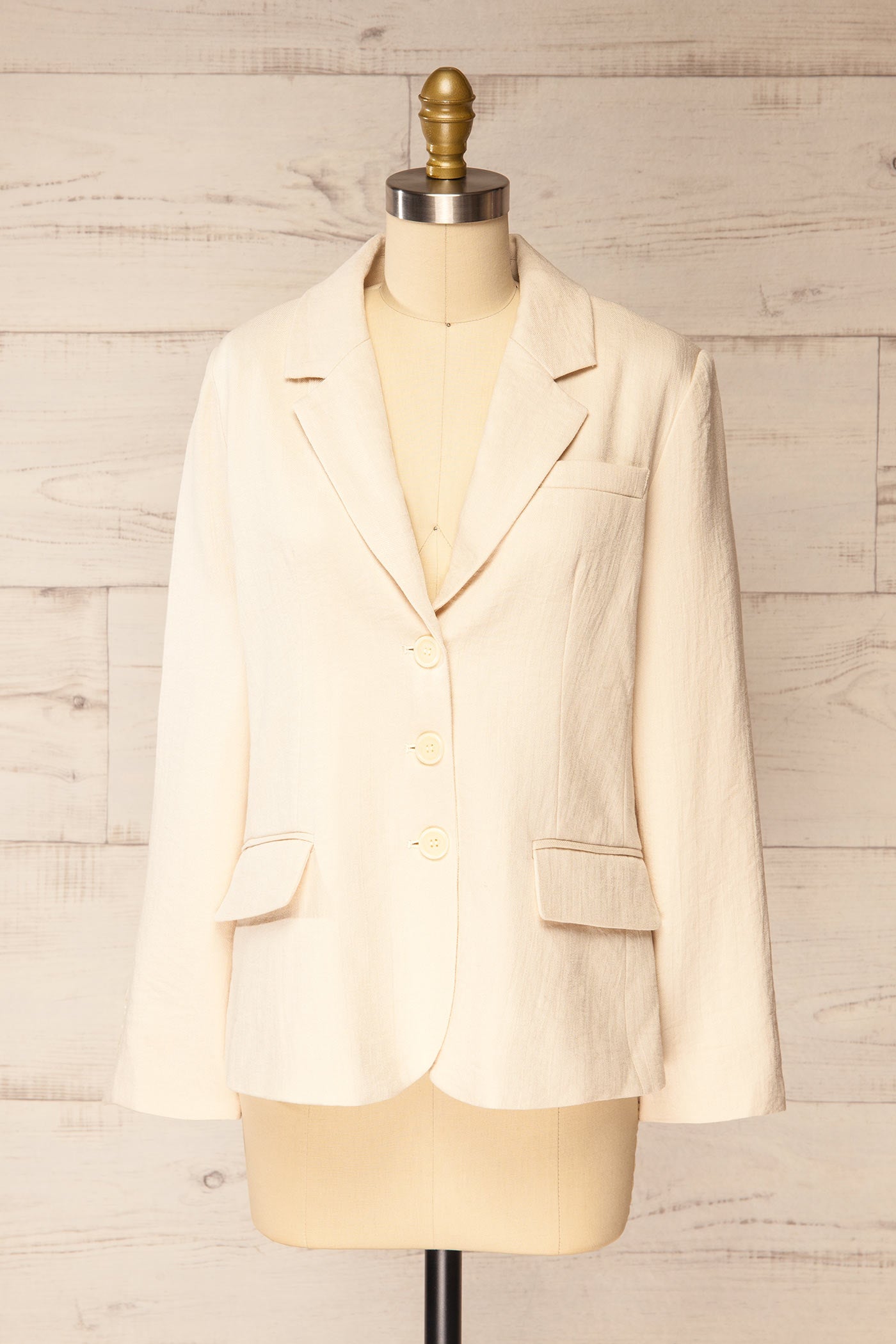 Frontview of Rajmahal Structured Ivory Blazer with Flap Pockets at la petite garçonne