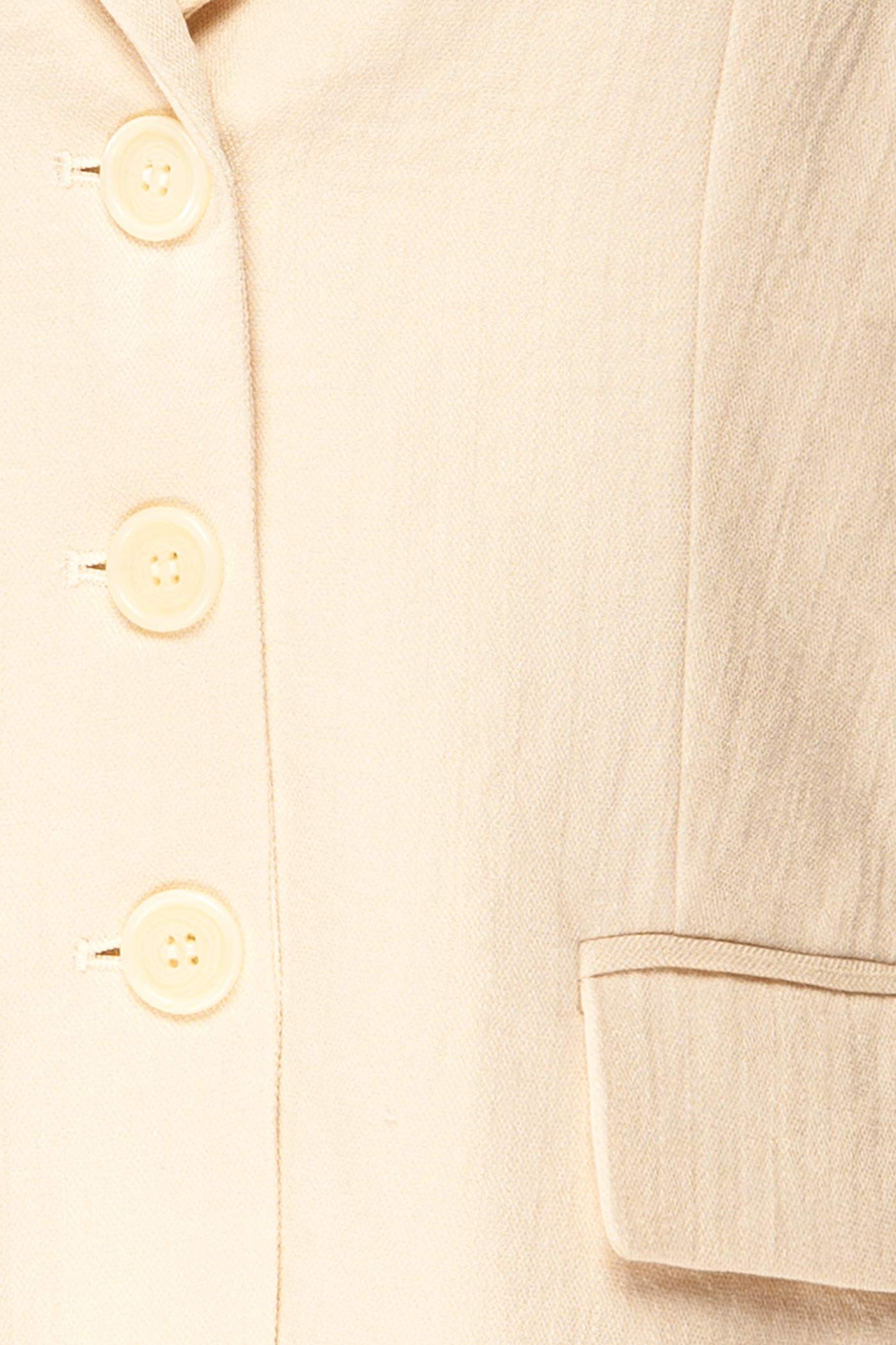 close-up of Rajmahal Structured Ivory Blazer with Flap Pockets at la petite garçonne
