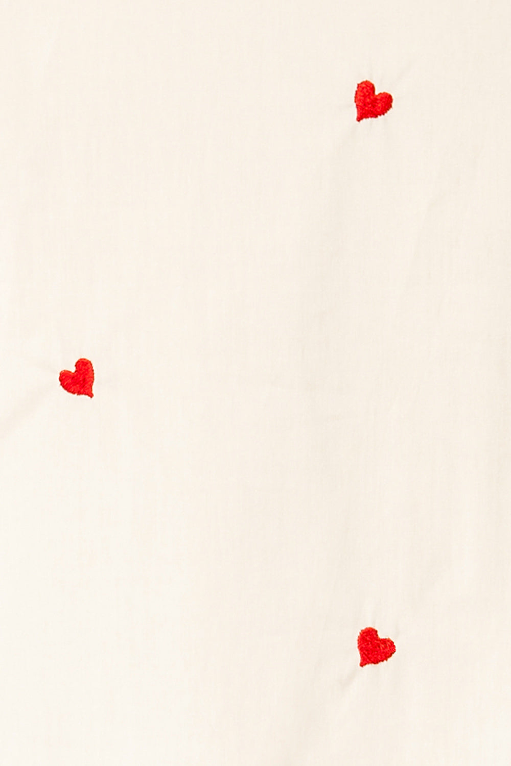 Rajouri White Button-Up Blouse with Red Heart Embroidery | La petite garçonne fabric