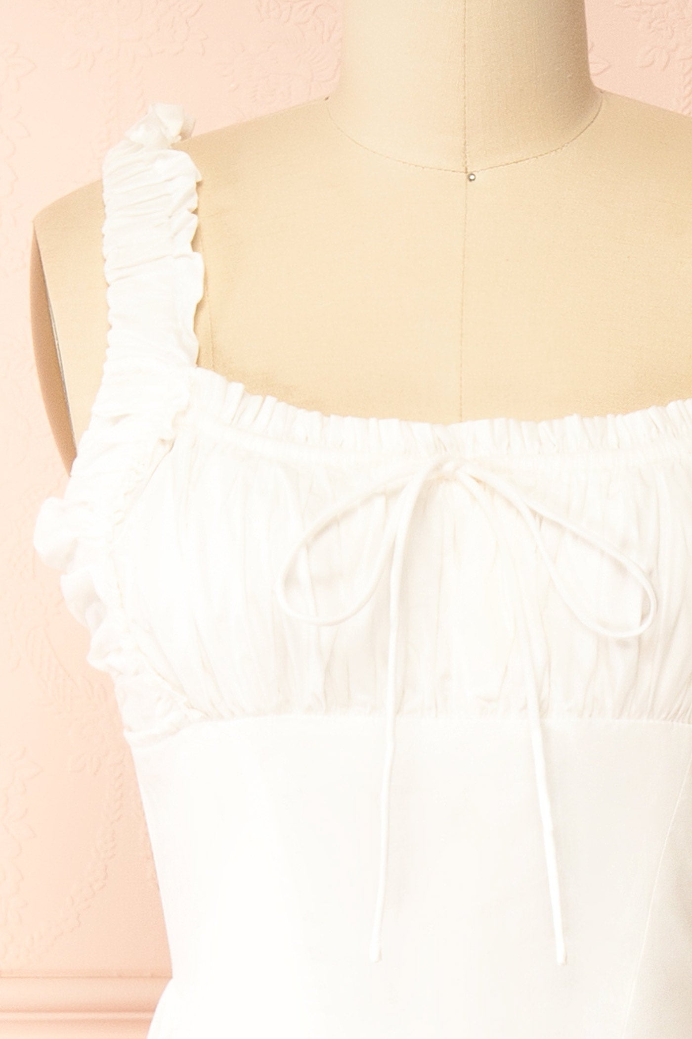 Close-up of Rhianon Ivory Maxi A-Line Dress on a mannequin from boutique 1861