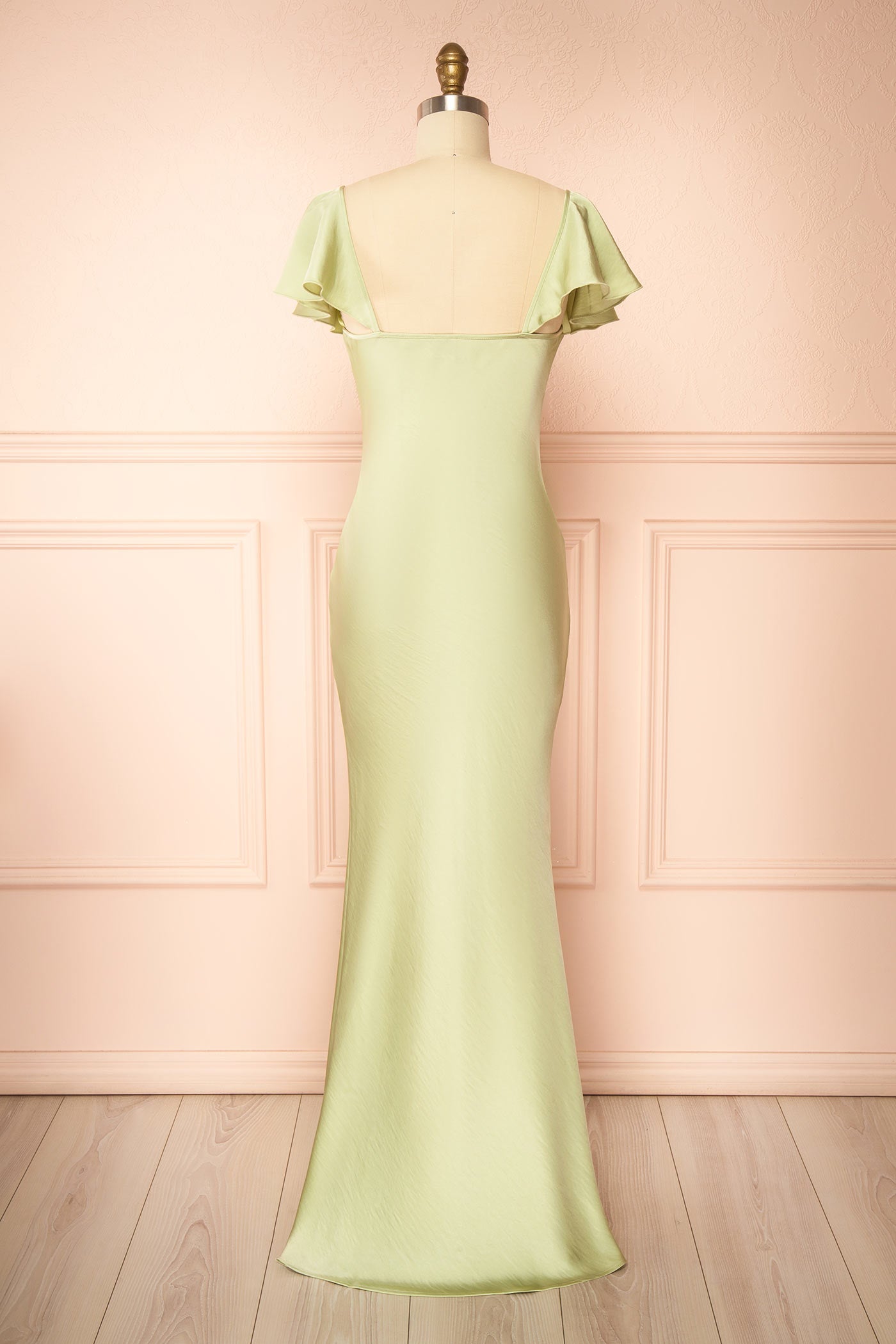 Back view Rhiar Sage Satin Maxi Dress with Butterfly Sleeves and Flower Detail at la boutique 1861