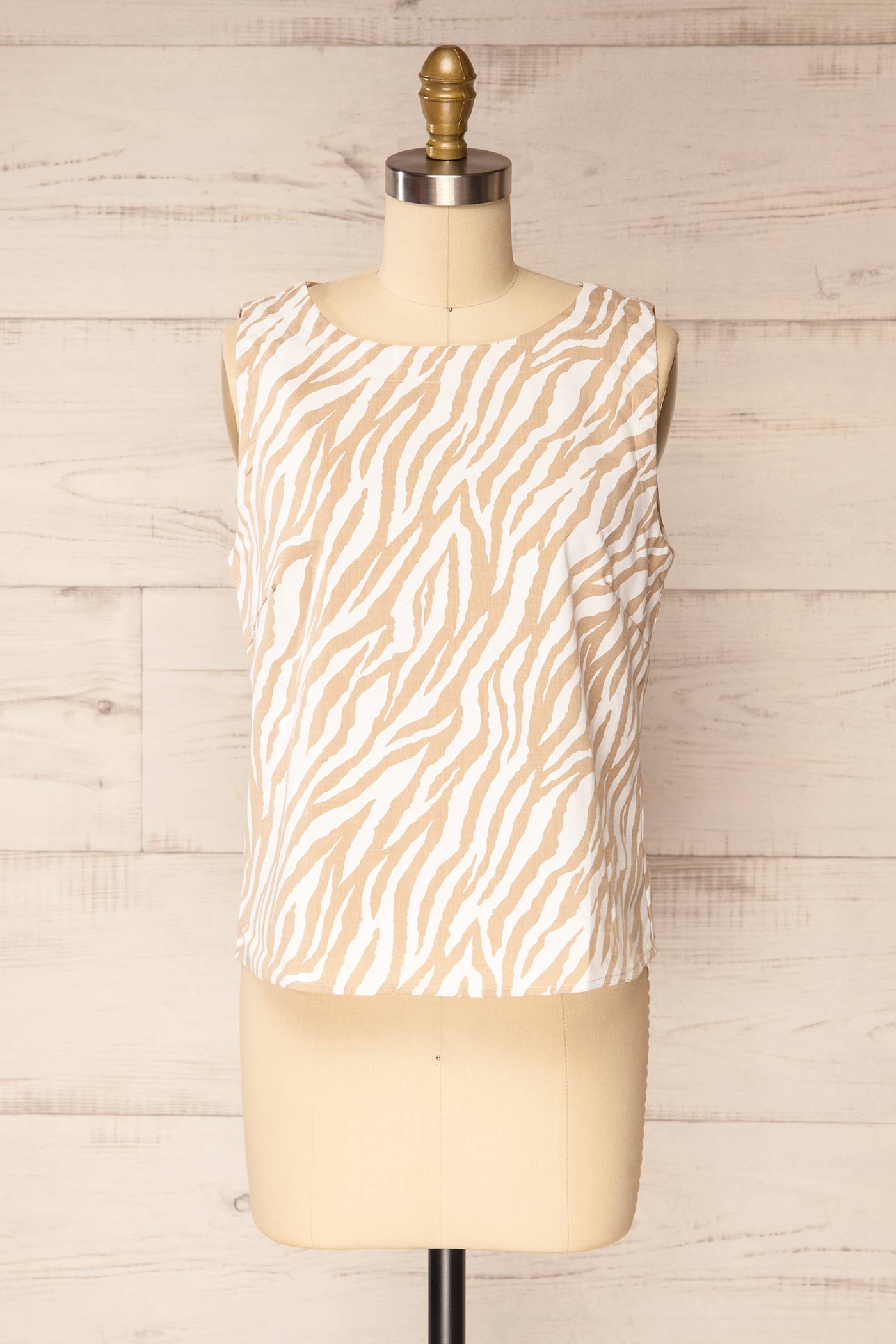 Frontview Roscoe Sleeveless White and Beige Zebra Print Top at la petite garçonne