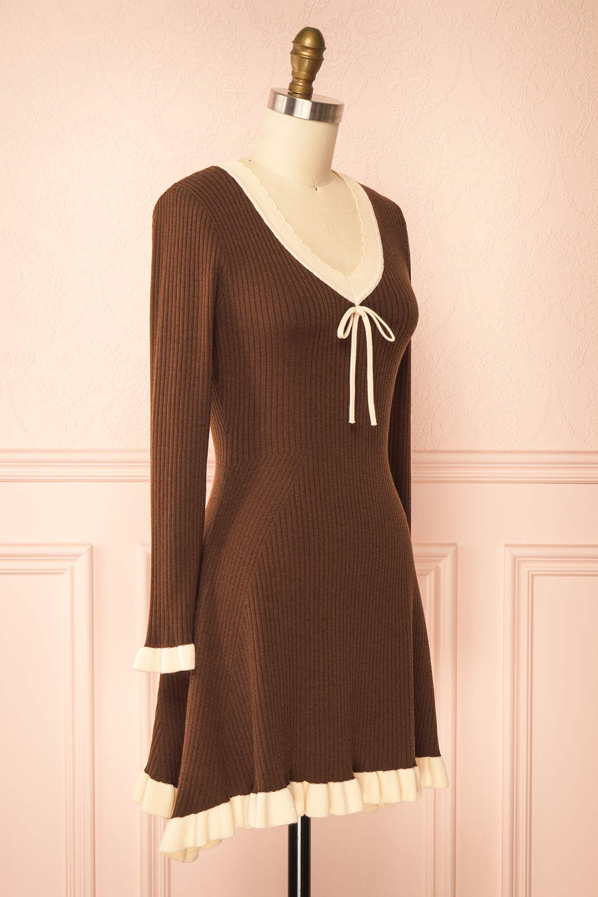 side view of Sabrinne Brown Ribbed Knit Long Sleeve Mini Dress with Contrast Ruffle Trim at Boutique 1861