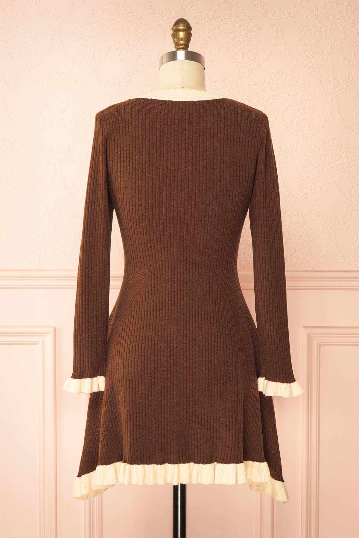 back view of Sabrinne Brown Ribbed Knit Long Sleeve Mini Dress with Contrast Ruffle Trim at Boutique 1861